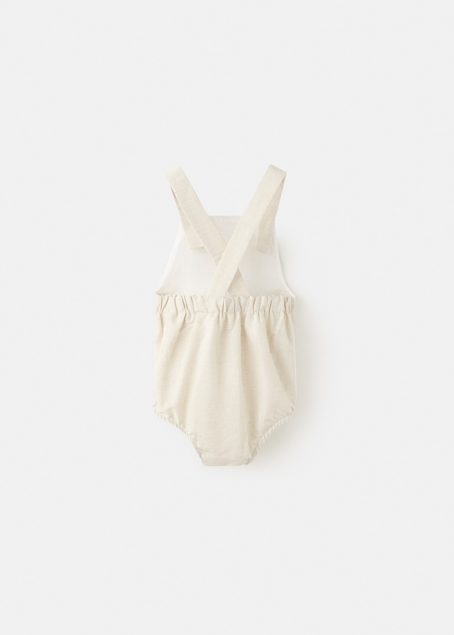 Linen romper - Reverse of the article