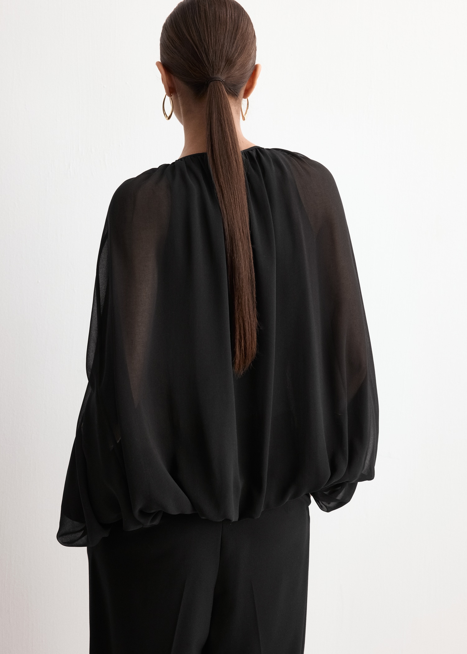 Puff sleeves blouse - Reverse of the article