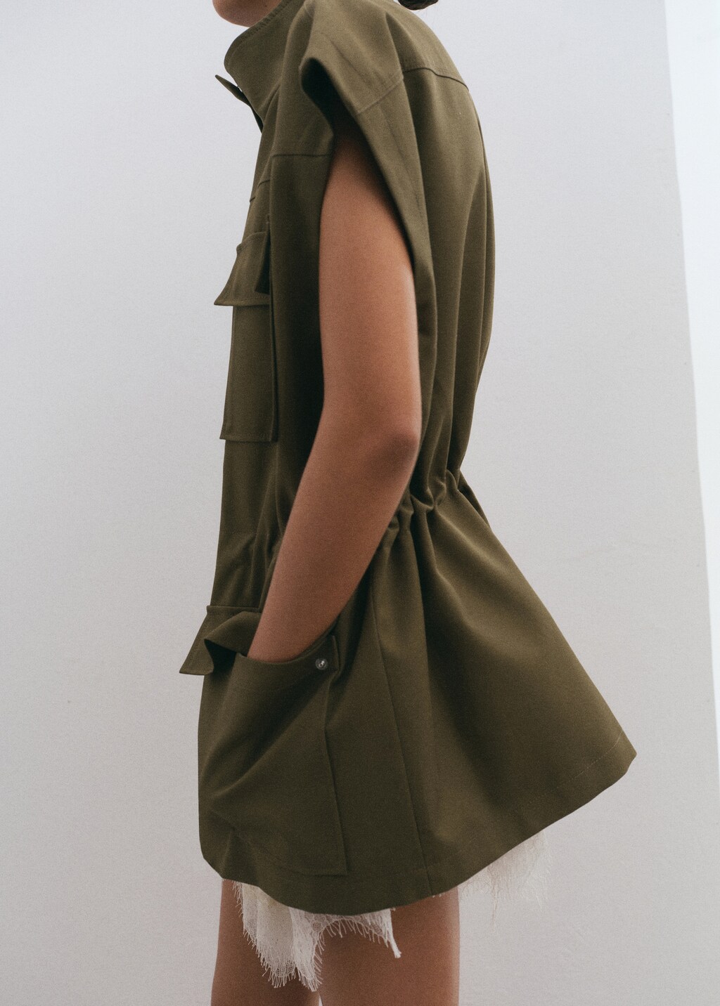 High-neck vest with pockets - image 4