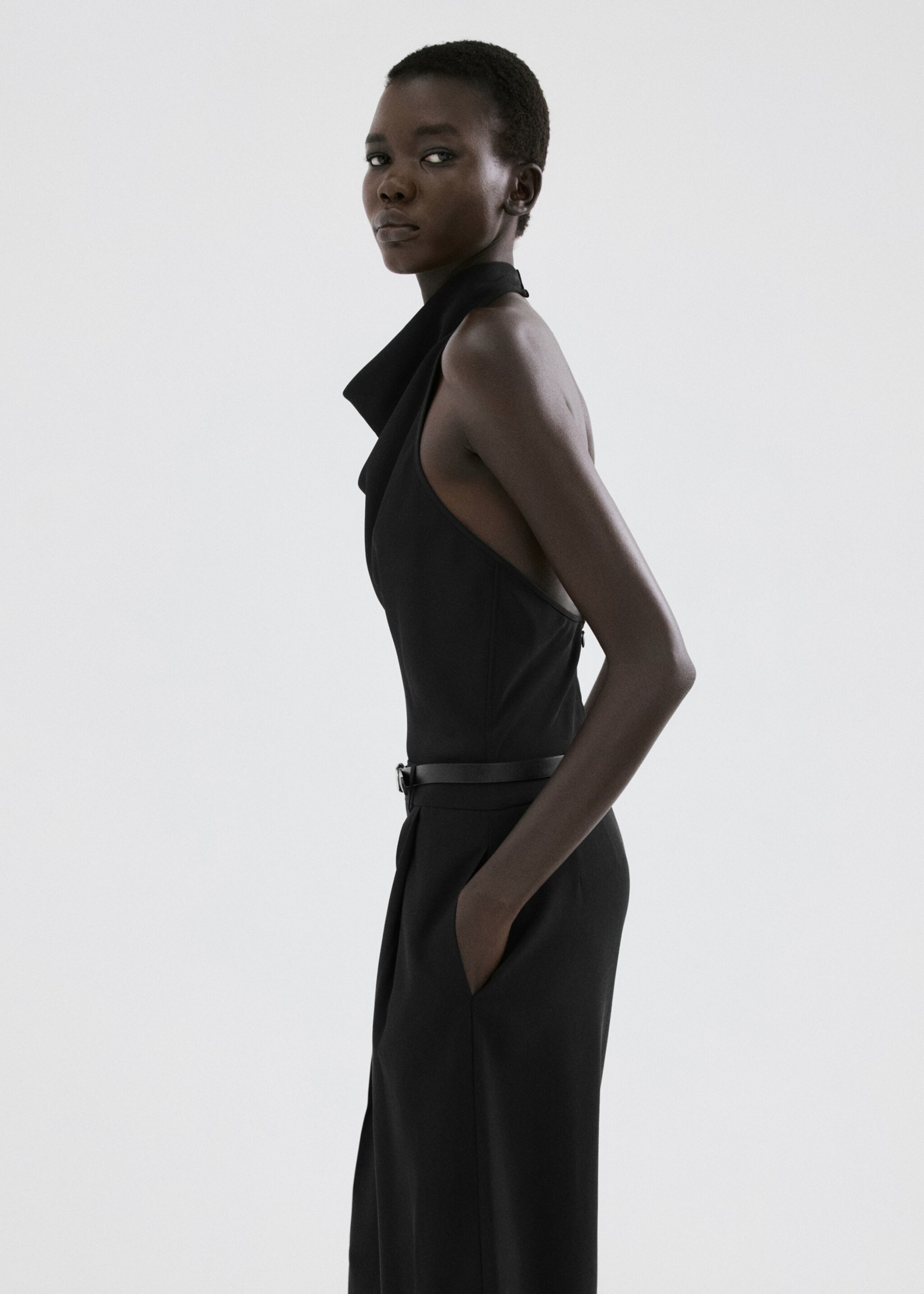Halter neck jumpsuit with combined detailing - Medium plane, Black. Ref: 27085831-00.