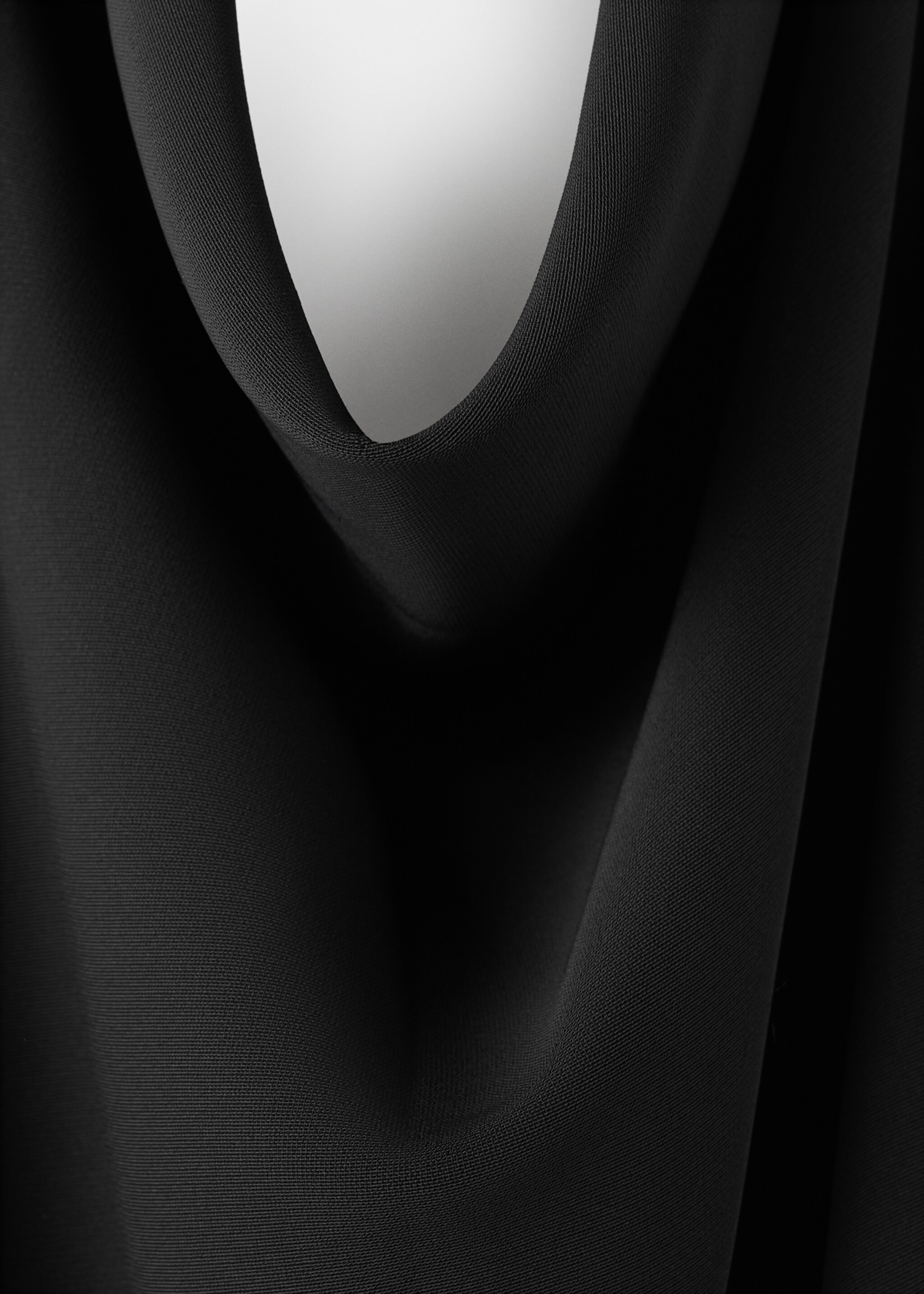 Halter neck jumpsuit with combined detailing - Details of the article 0, Black. Ref: 27085831-00.