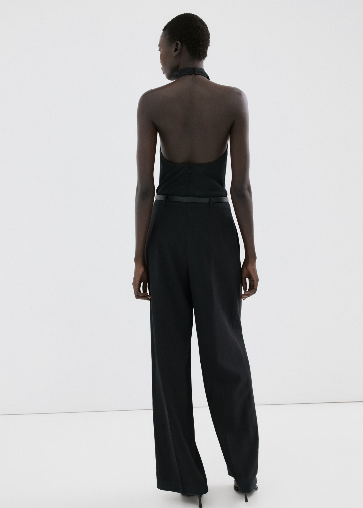 Halter neck jumpsuit with combined detailing - Reverse of the article