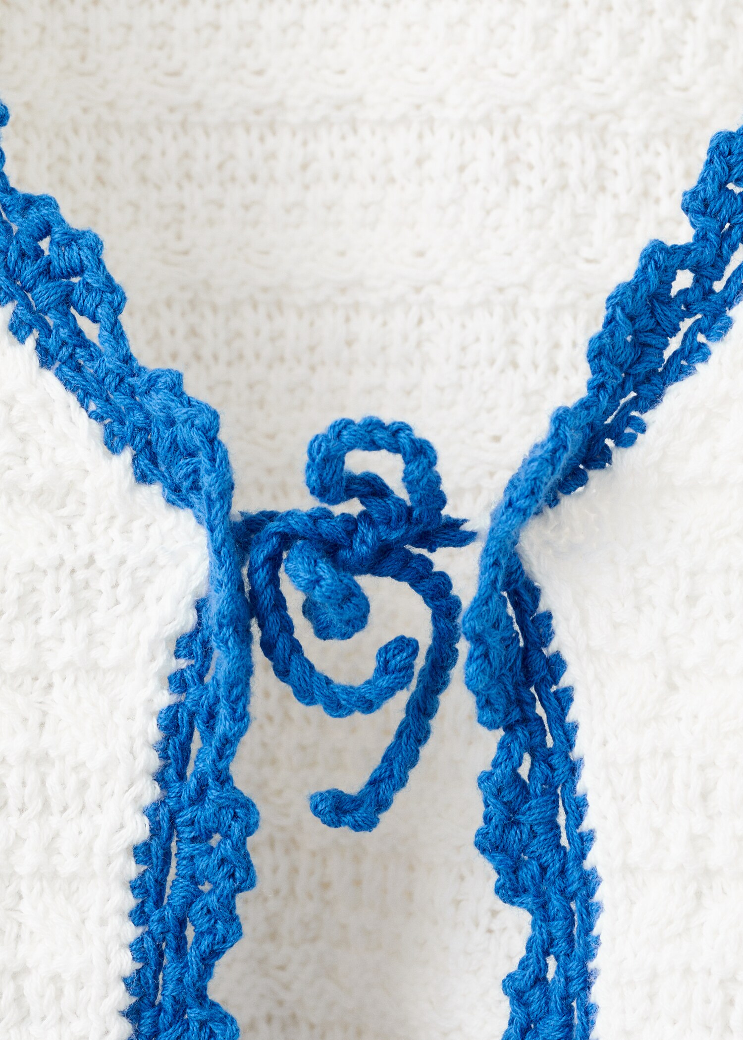 Openwork knitted cardigan with bow - Details of the article 8