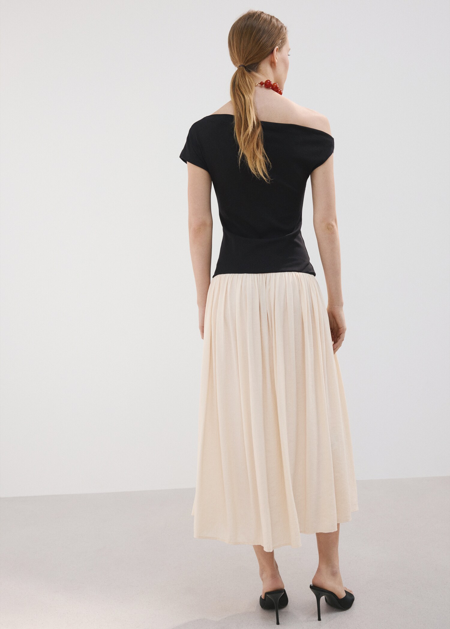 Asymmetrical flared dress - Reverse of the article