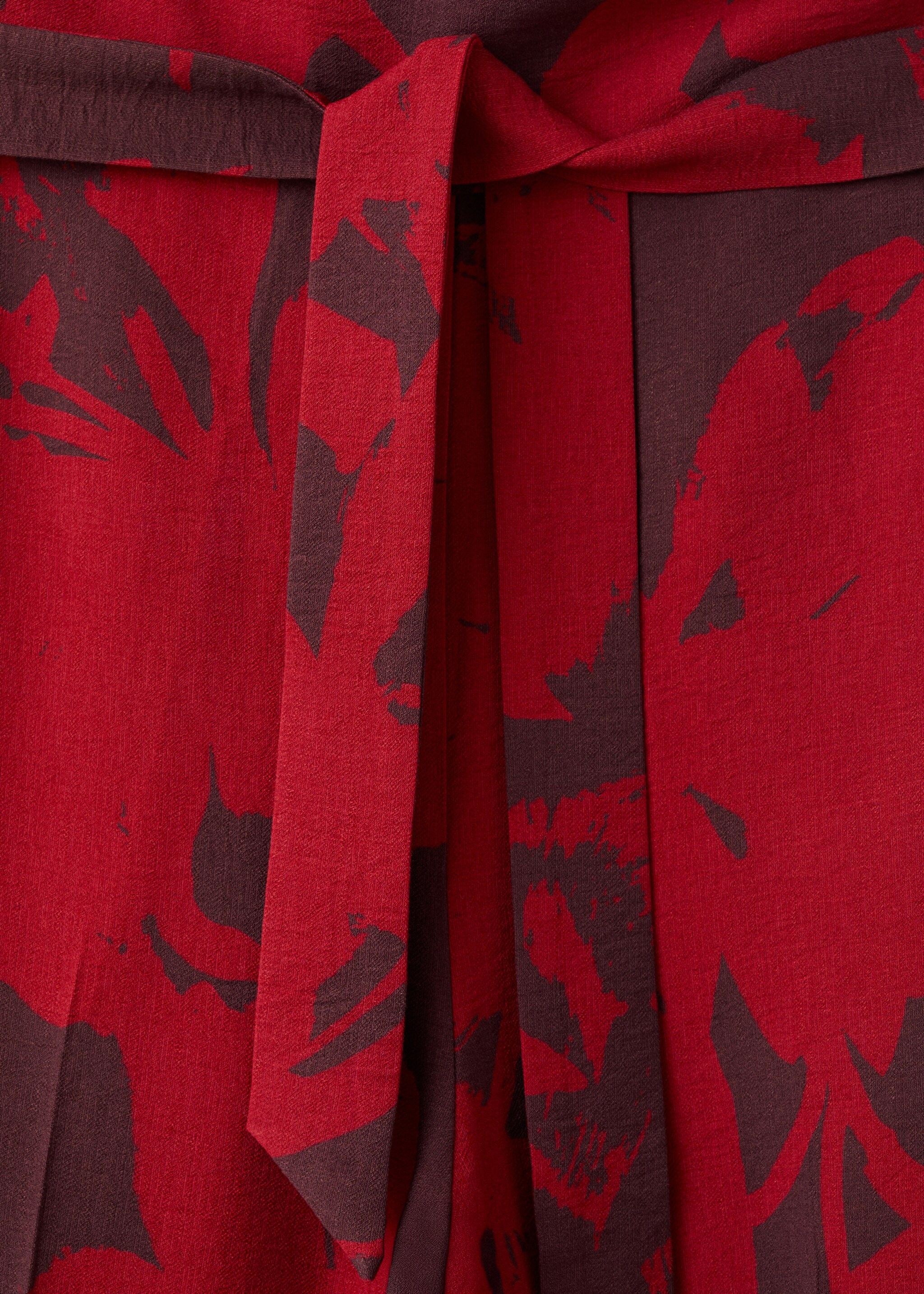 Printed asymmetrical jumpsuit - Details of the article 8, Red. Ref: 27087940-00.