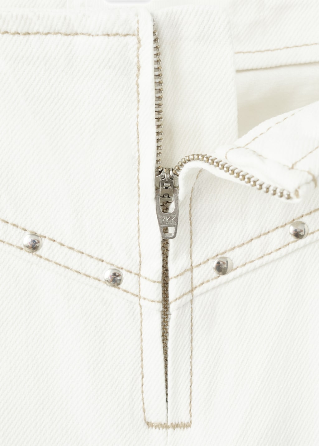 Low-waist studded jeans