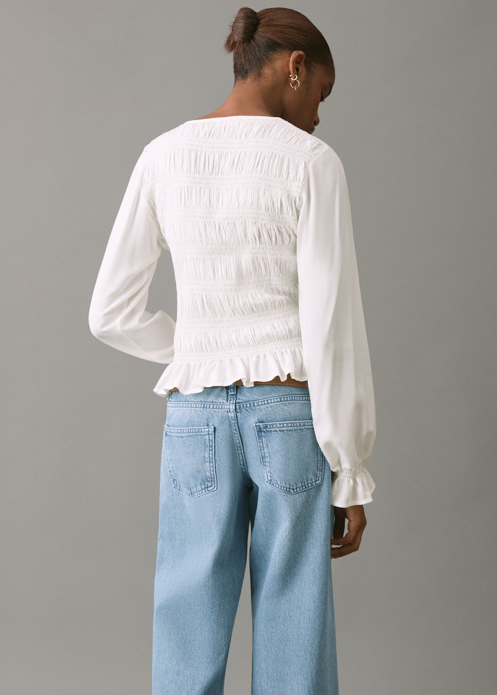 Ruched blouse with ruffles