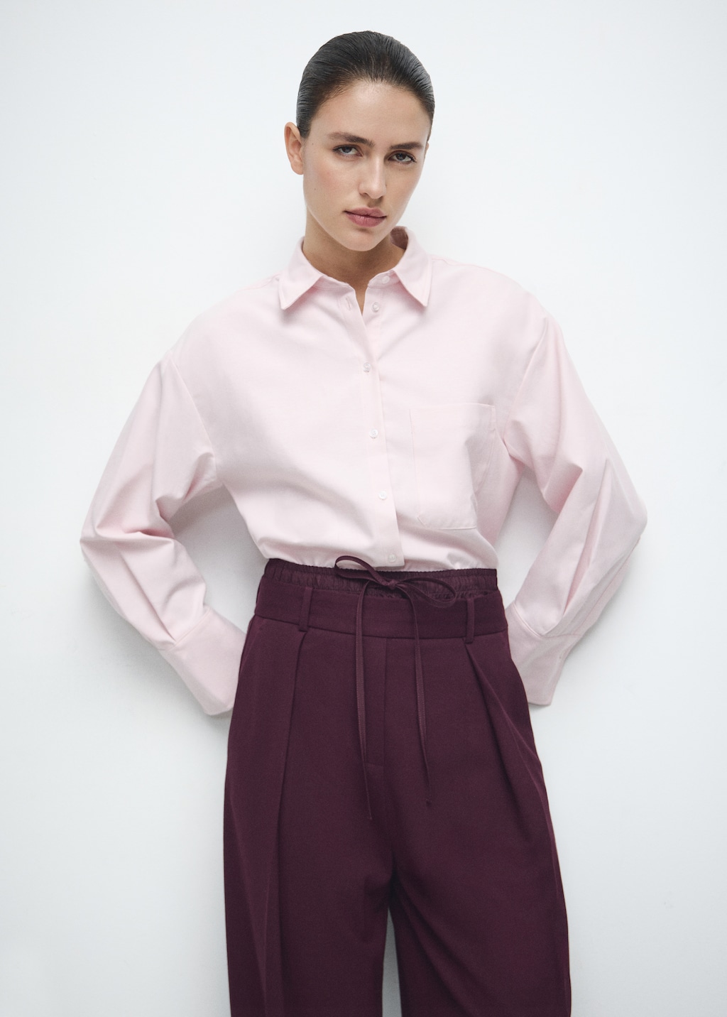 Pleated trousers with combined waistband - image 4