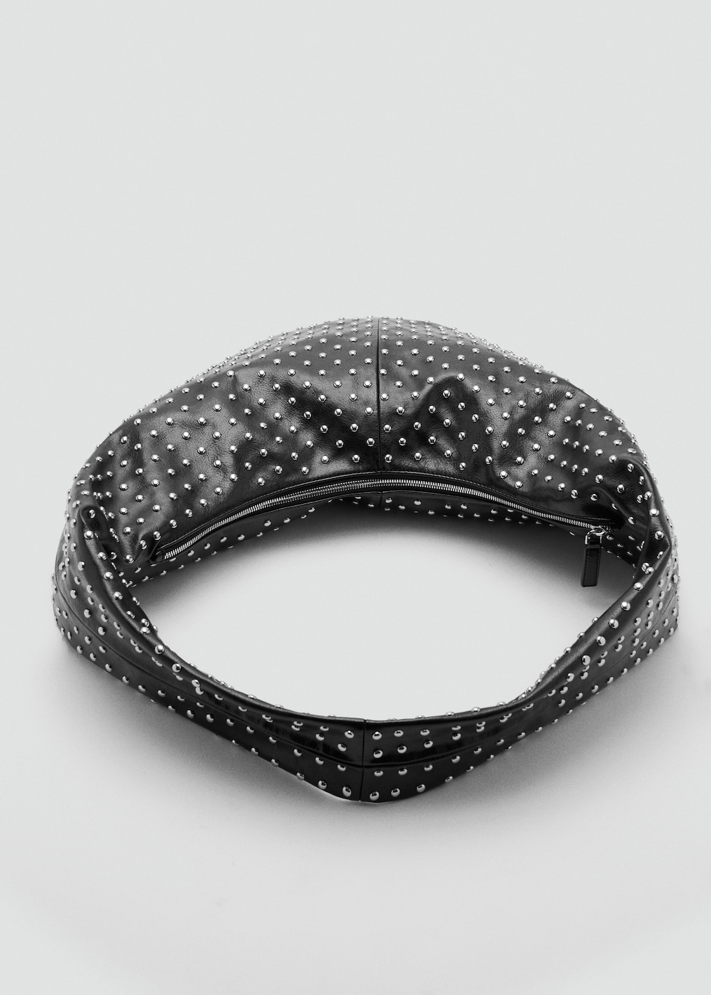 Oval studded shoulder bag