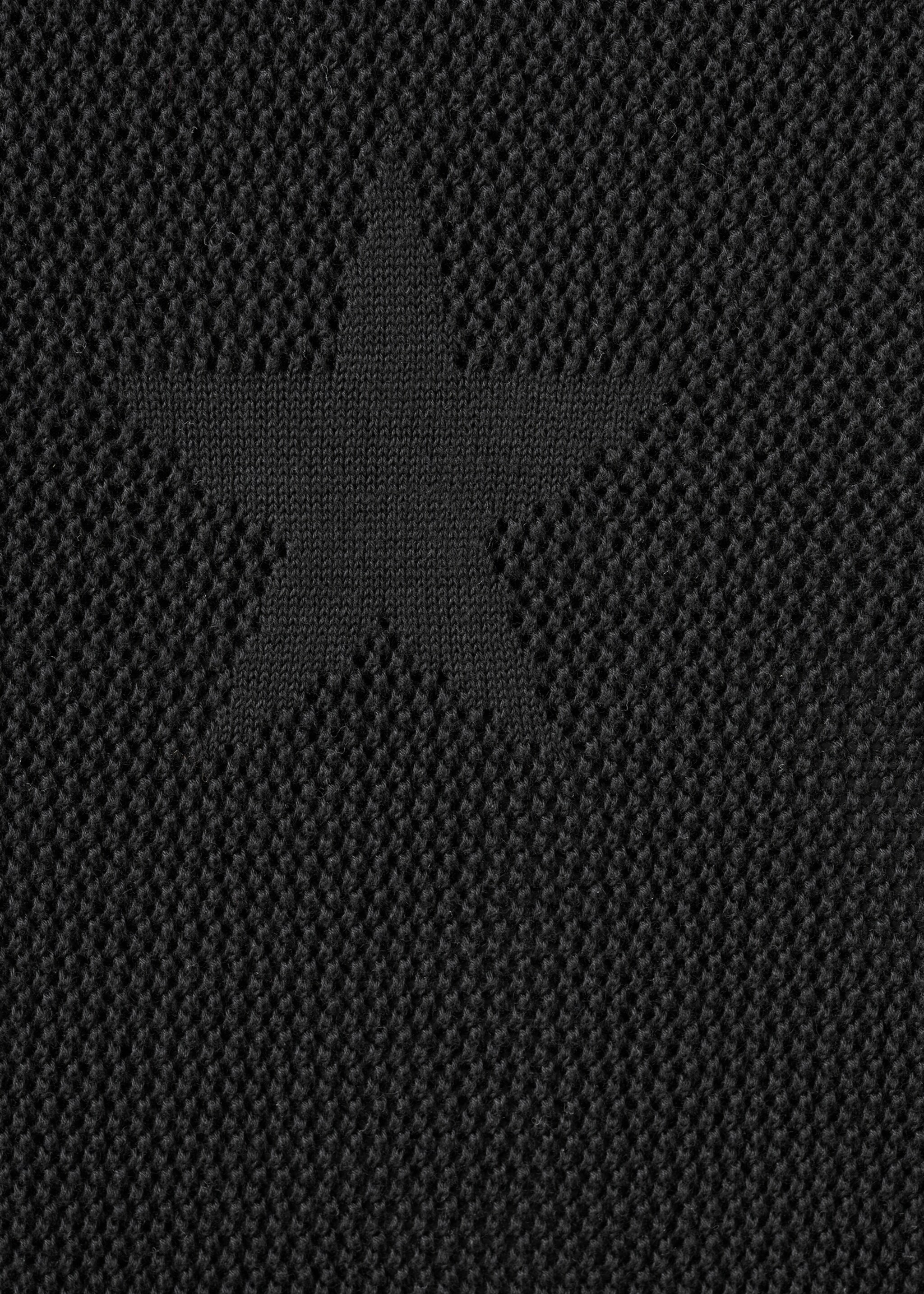 Semi-transparent knitted skirt with star - Details of the article 0, Black. Ref: 27091280-00.