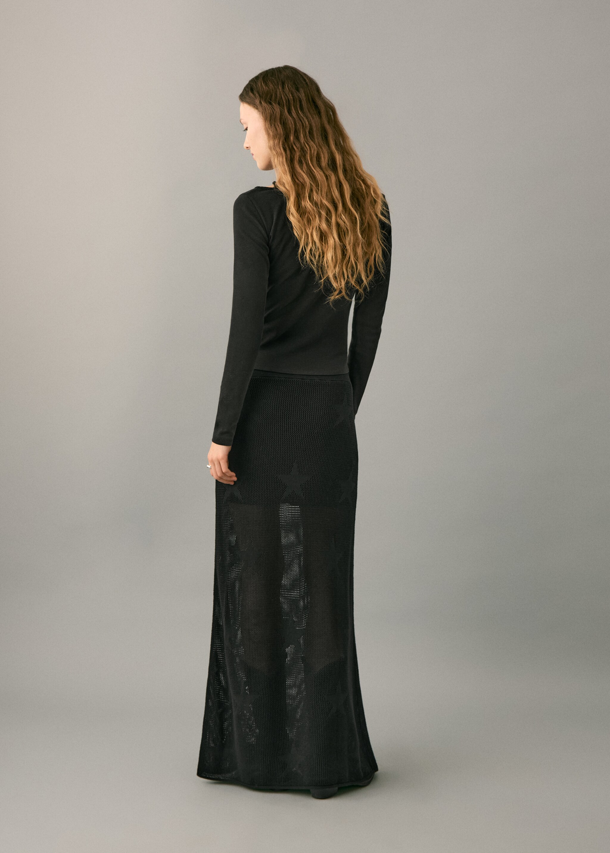 Semi-transparent knitted skirt with star - Reverse of the article, Black. Ref: 27091280-00.