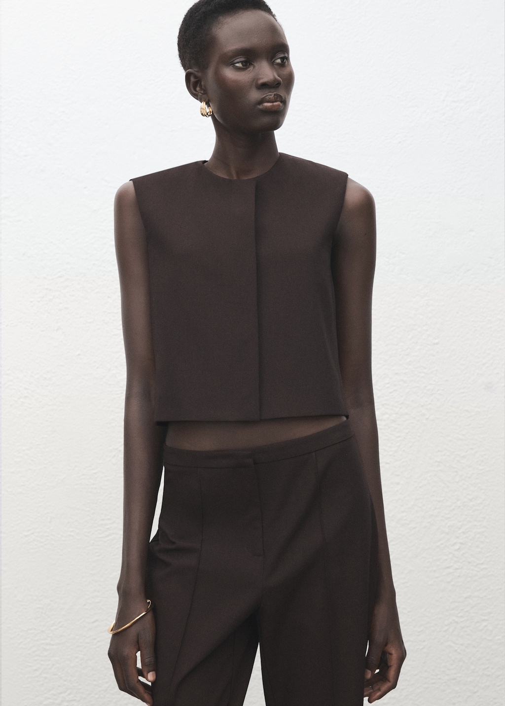 Low-rise flared trousers