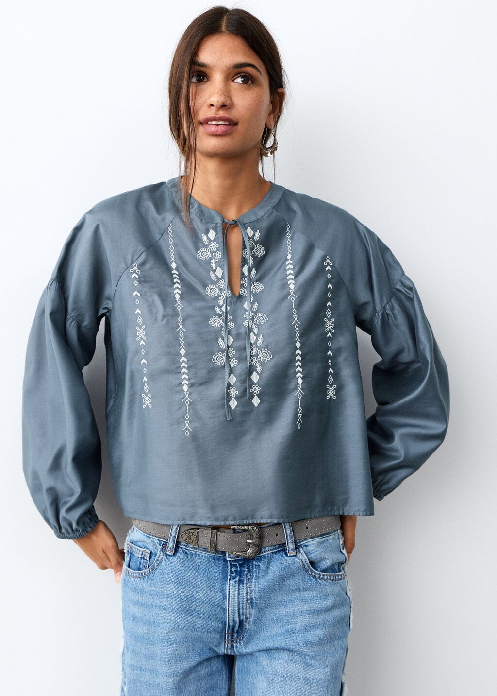 Embroidered blouse with bow