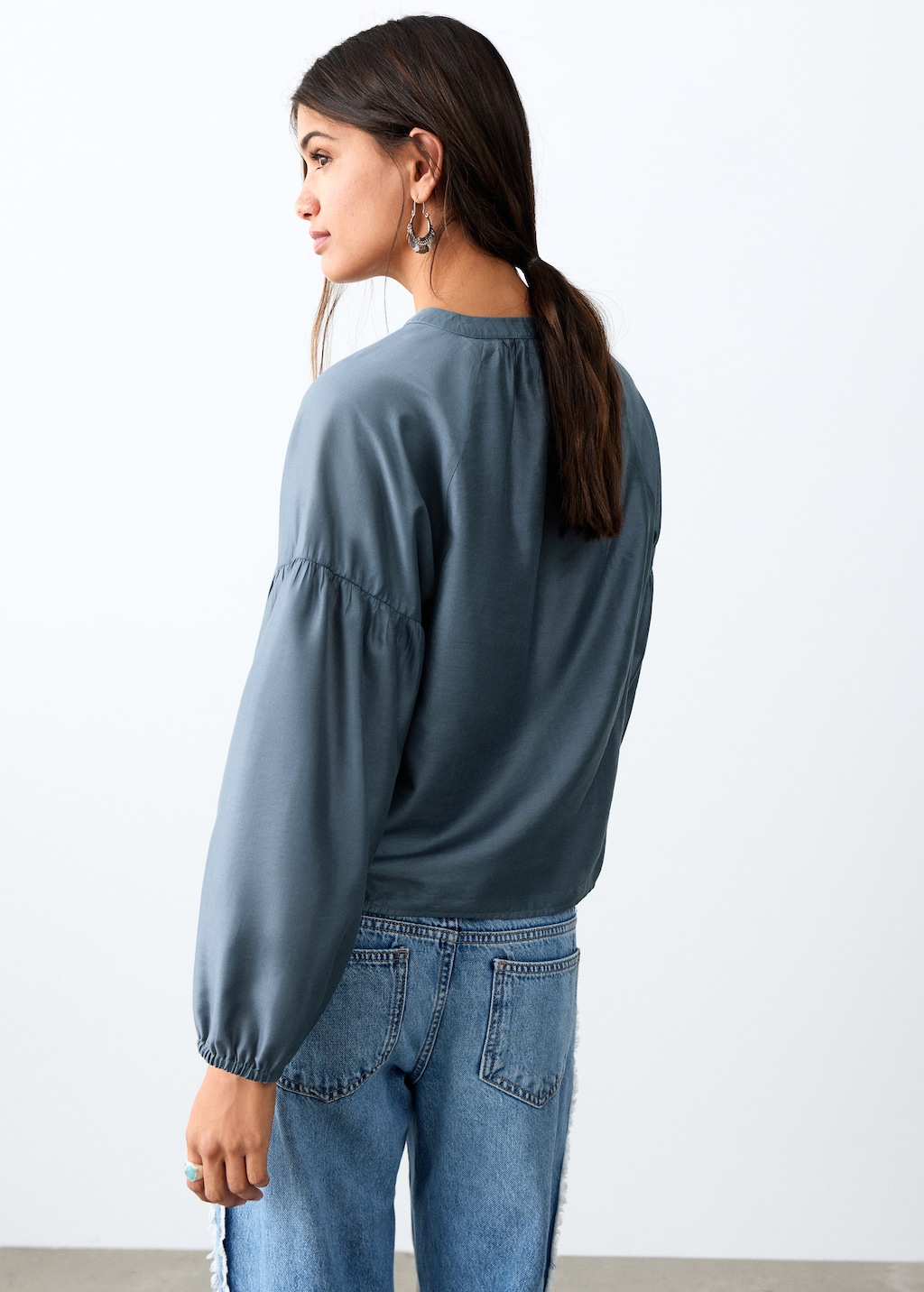 Embroidered blouse with bow