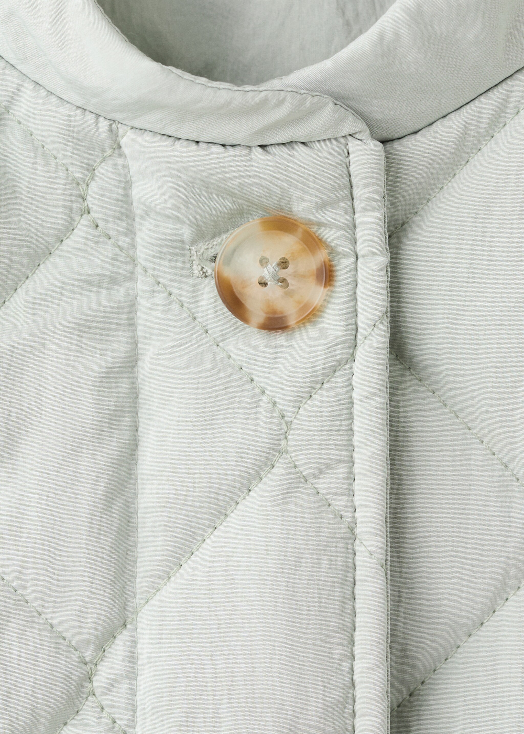 Padded jacket with buttons - Details of the article 8, Aqua Green. Ref: 27092889-00.