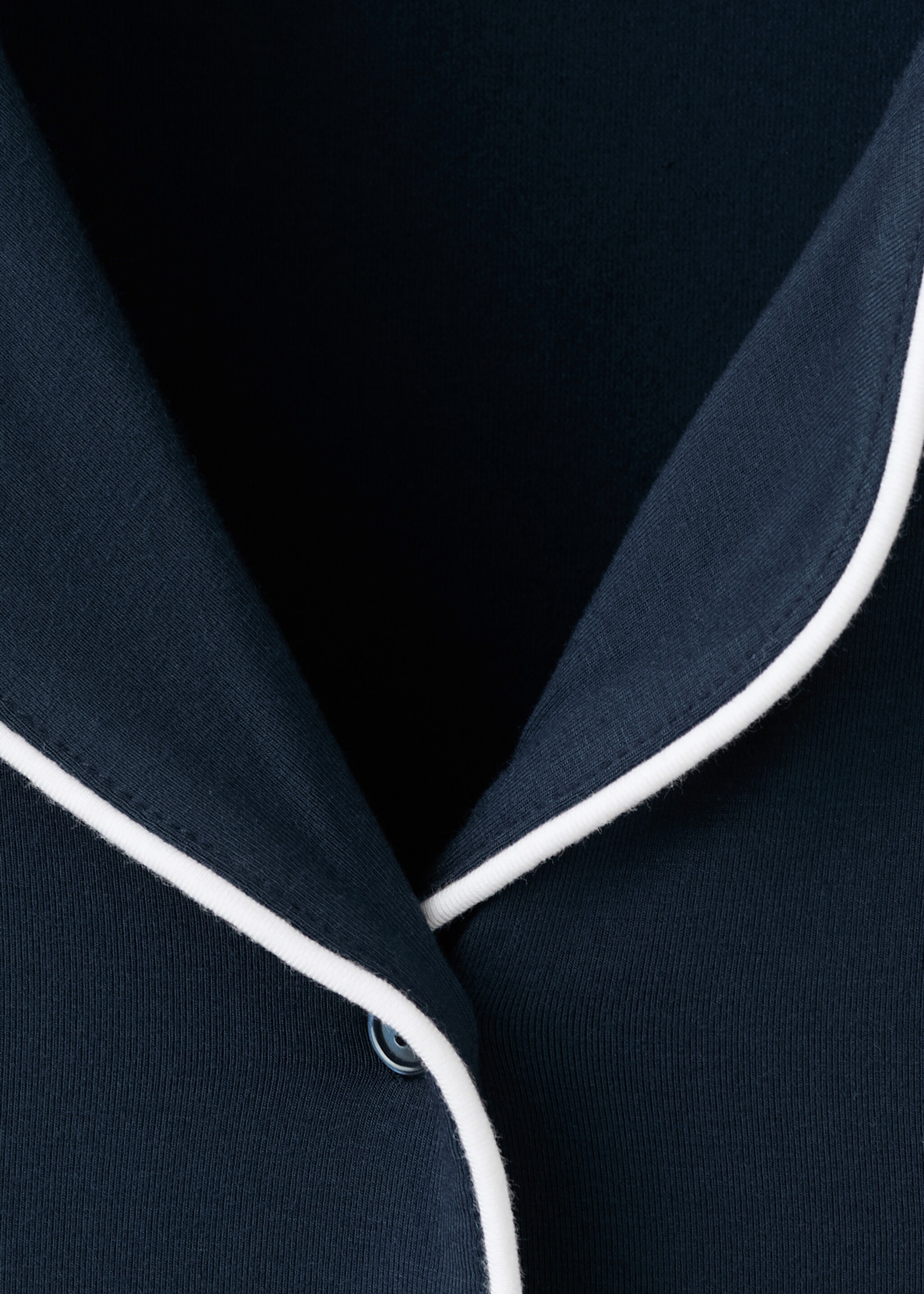 Two-piece pyjamas with piping - Details of the article 8, Indigo Blue. Ref: 27093329-00.