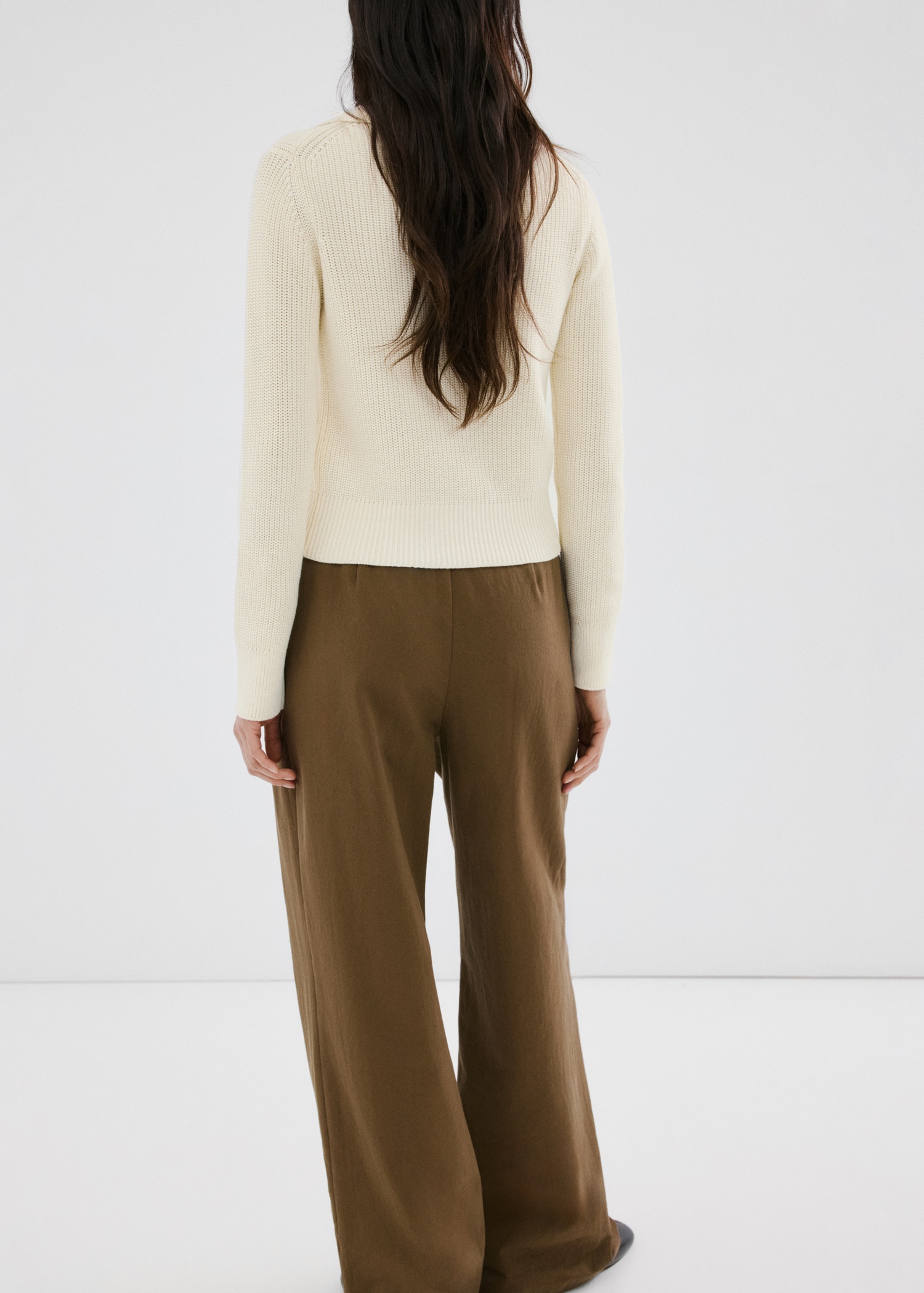 Knitted buttoned jacket - Reverse of the article