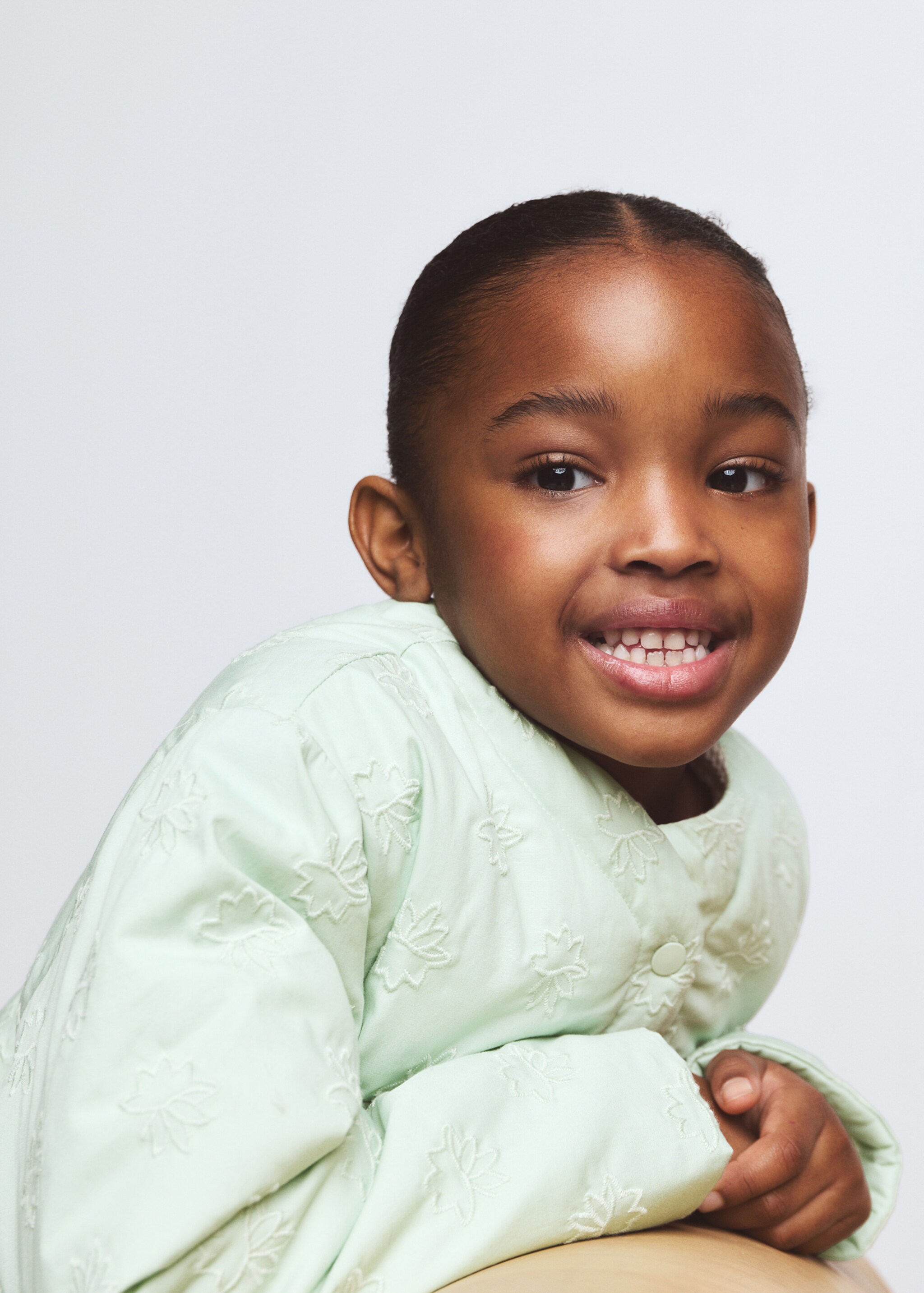 Quilted jacket with embroidered details - Details of the article 1, Pastel Green. Ref: 27096352-00.