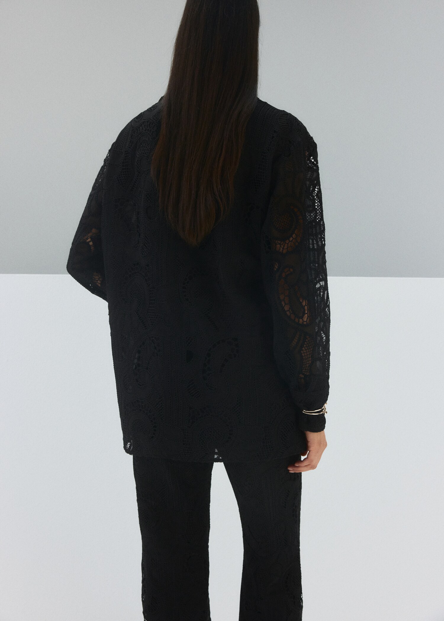 Embroidered openwork blouse - Reverse of the article