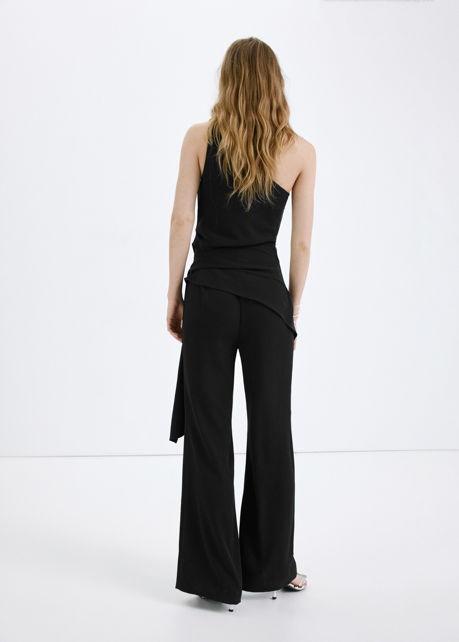 Asymmetrical jumpsuit with bow - Reverse of the article