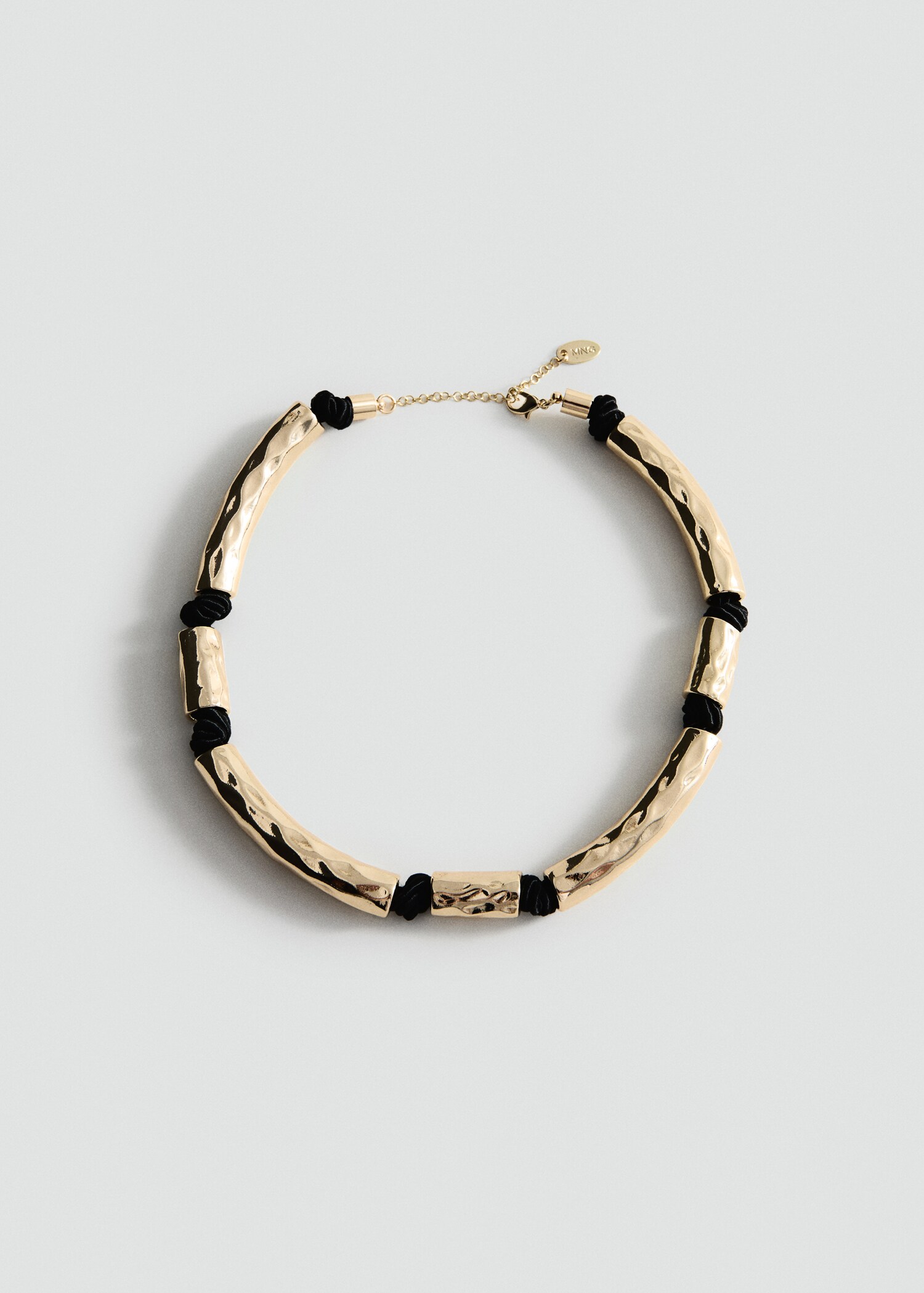 Necklace with irregular metallic pieces - Article without model