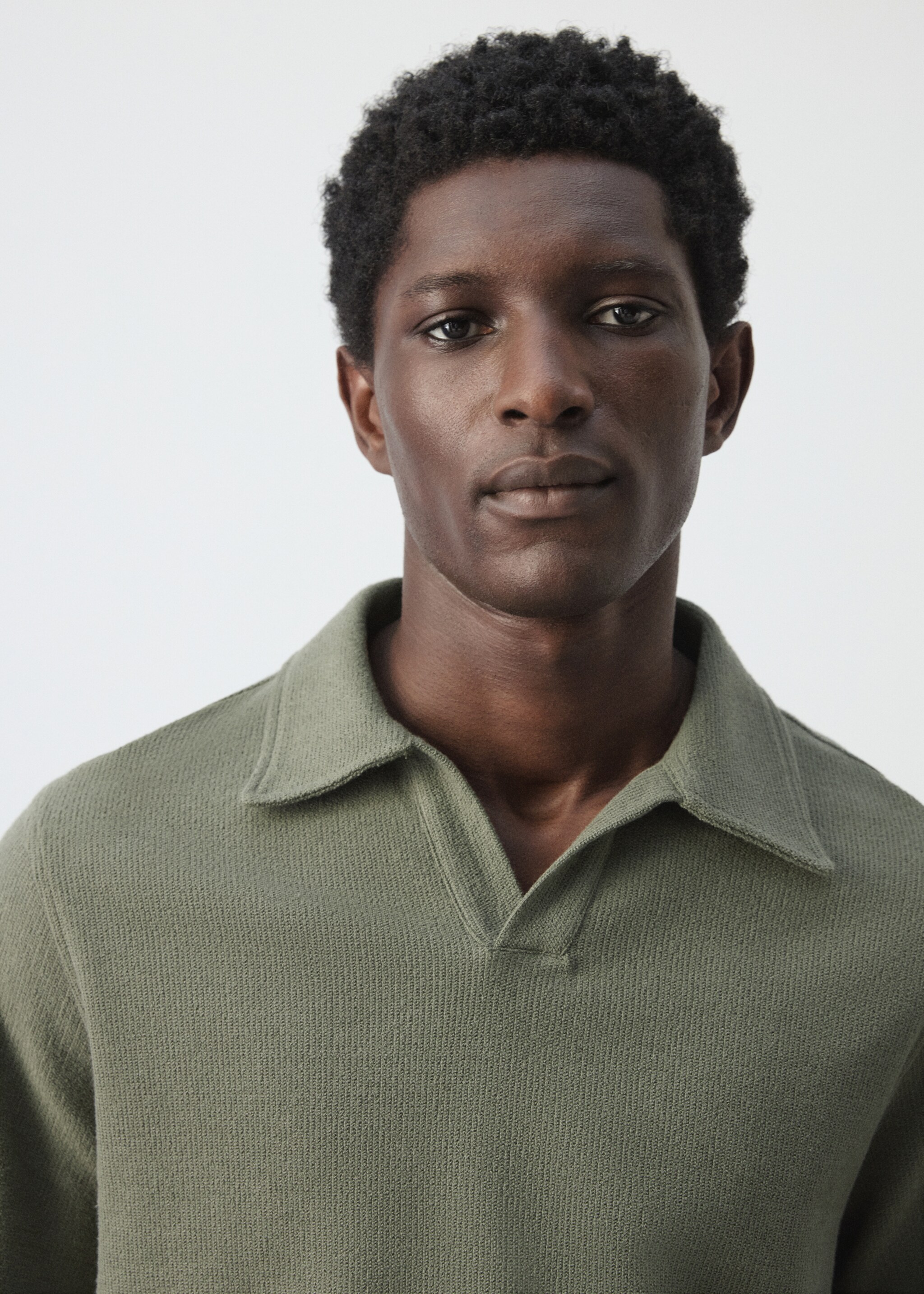 Regular-fit textured polo shirt - Details of the article 1, Forest Green. Ref: 27097895-00.