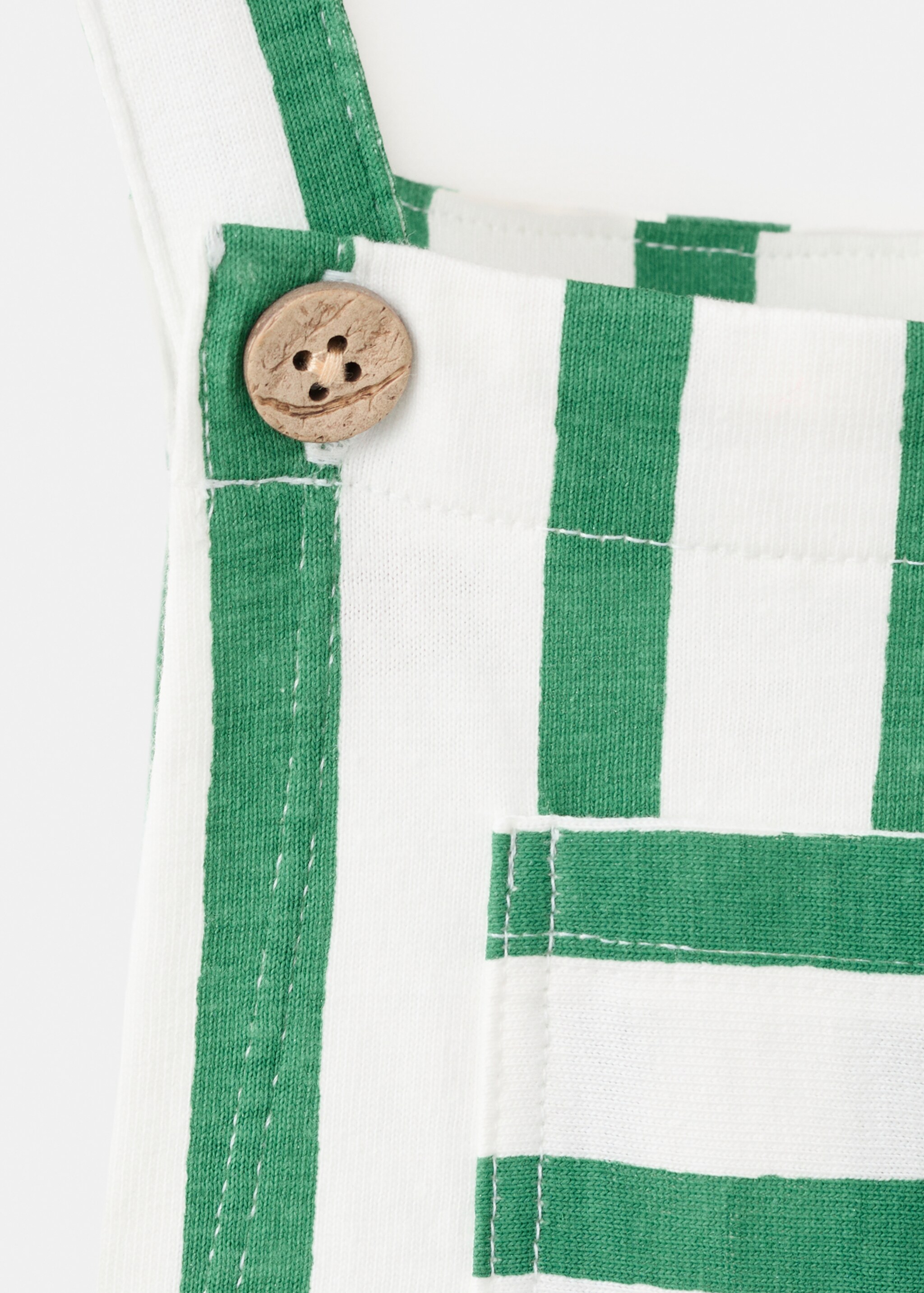 Striped dungarees with print detail - Details of the article 8, Green. Ref: 27097911-00.