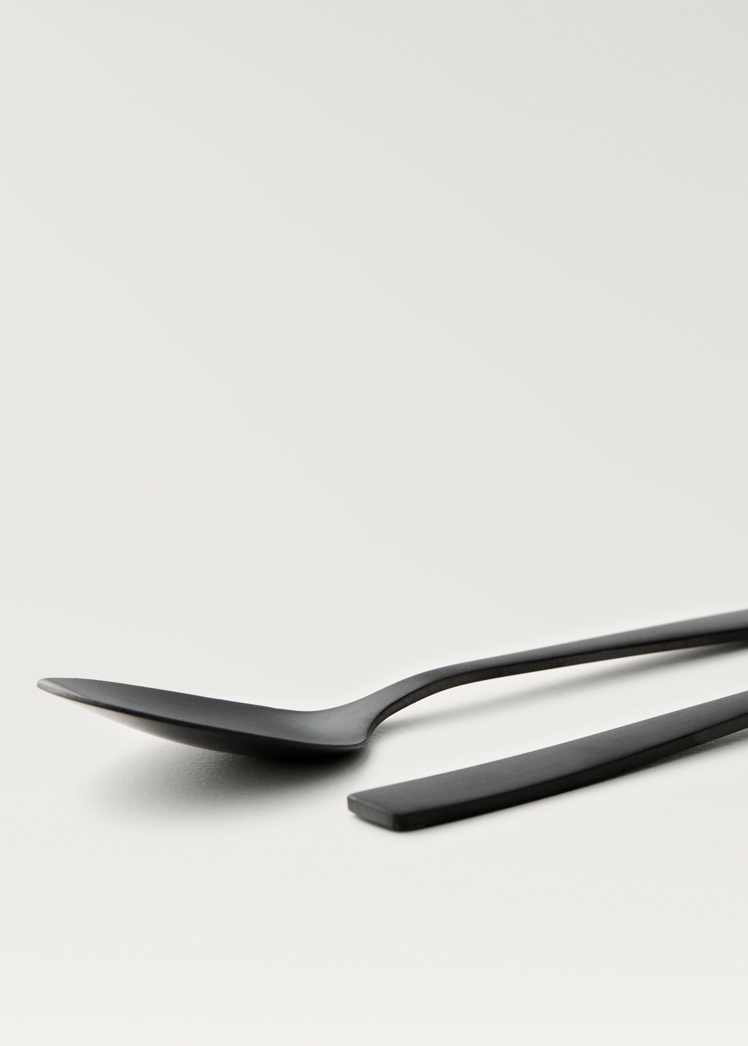 Set of 4 stainless steel dessert spoons with a matte finish - Details of the article 1