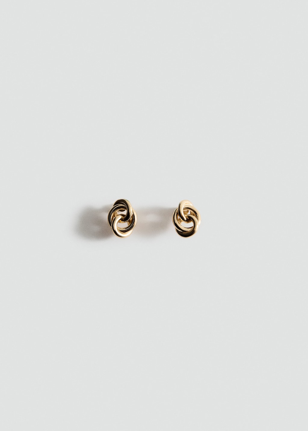 Mango Intertwined Hoop Earrings In Gold