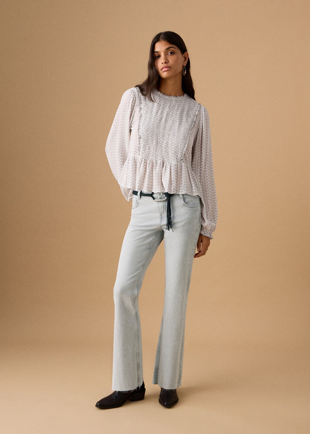Flared cropped jeans with studs