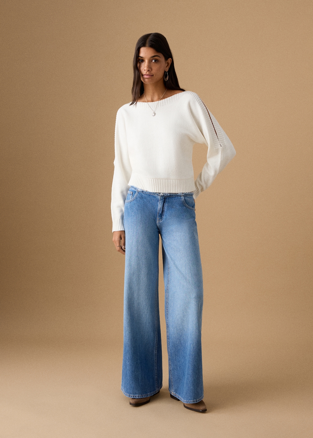 Knitted sweater with cut-out