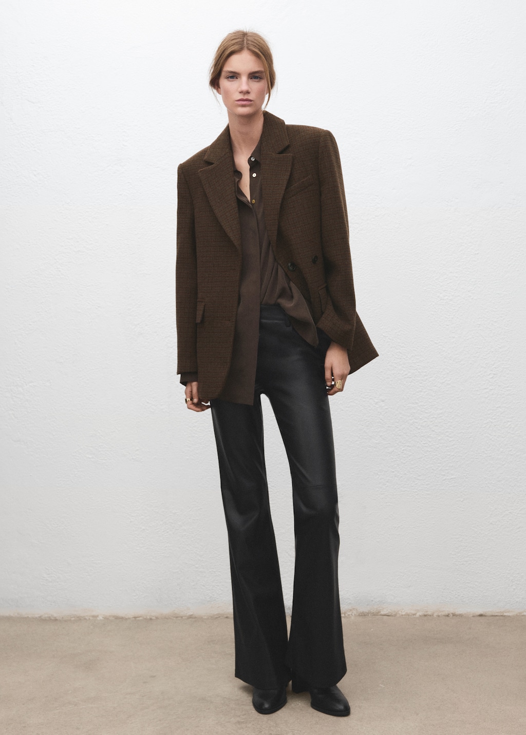 Faux-leather flared trousers