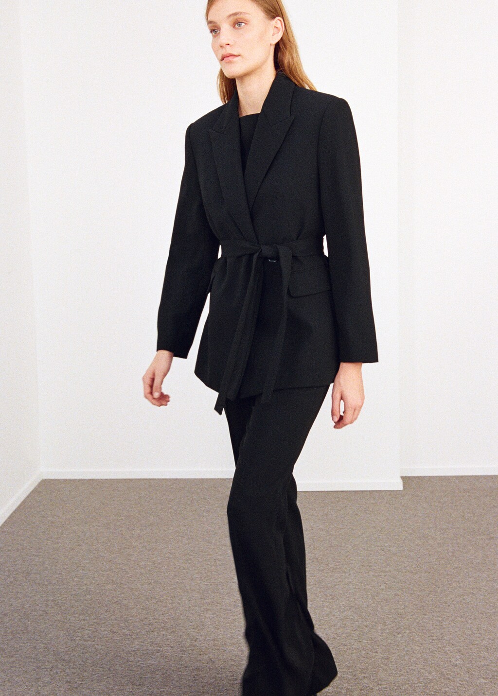 Suit jacket with belt