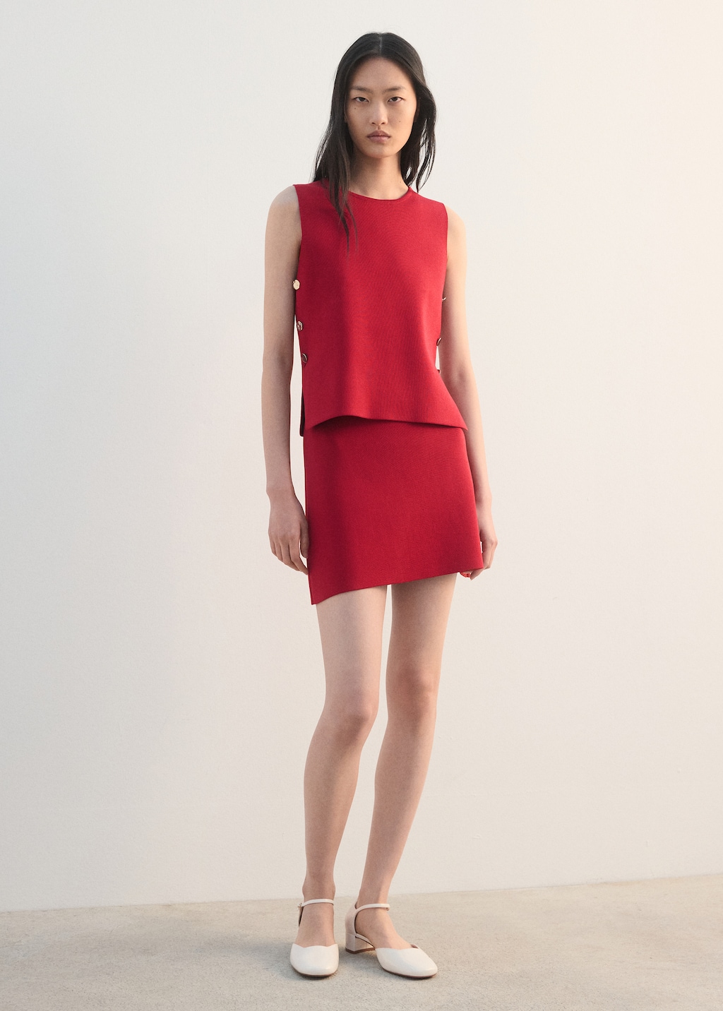 Knitted top with side buttons