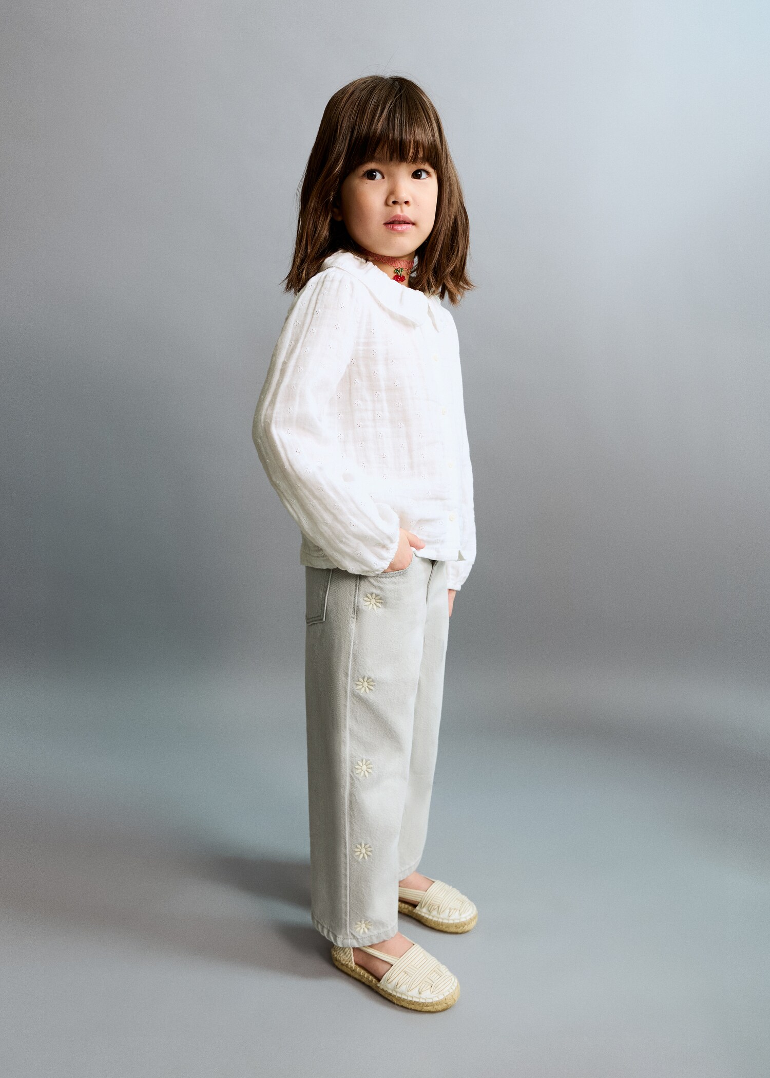 Straight-leg jeans with embroidered sun motifs - General plane