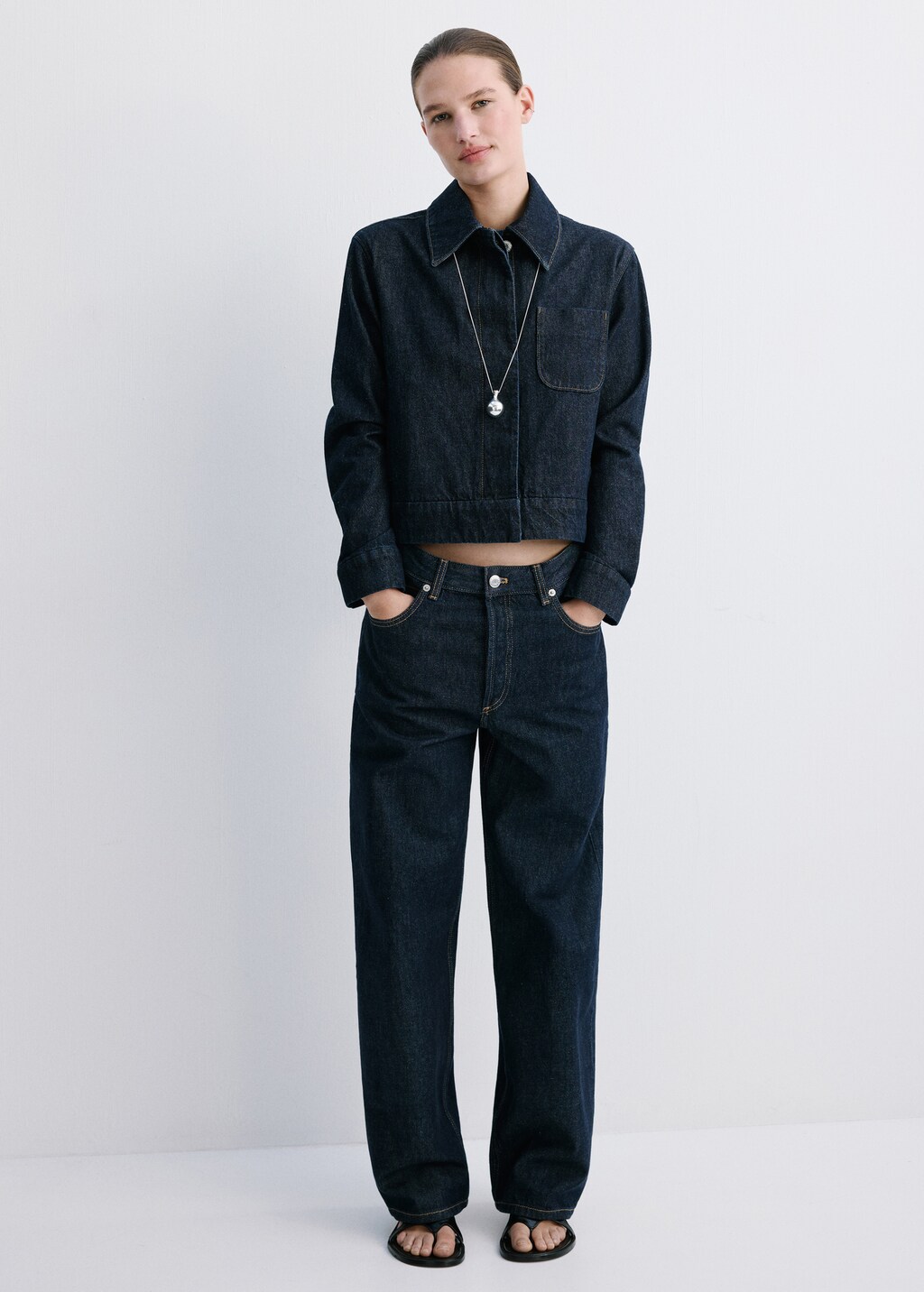 Fitted denim jacket with pockets