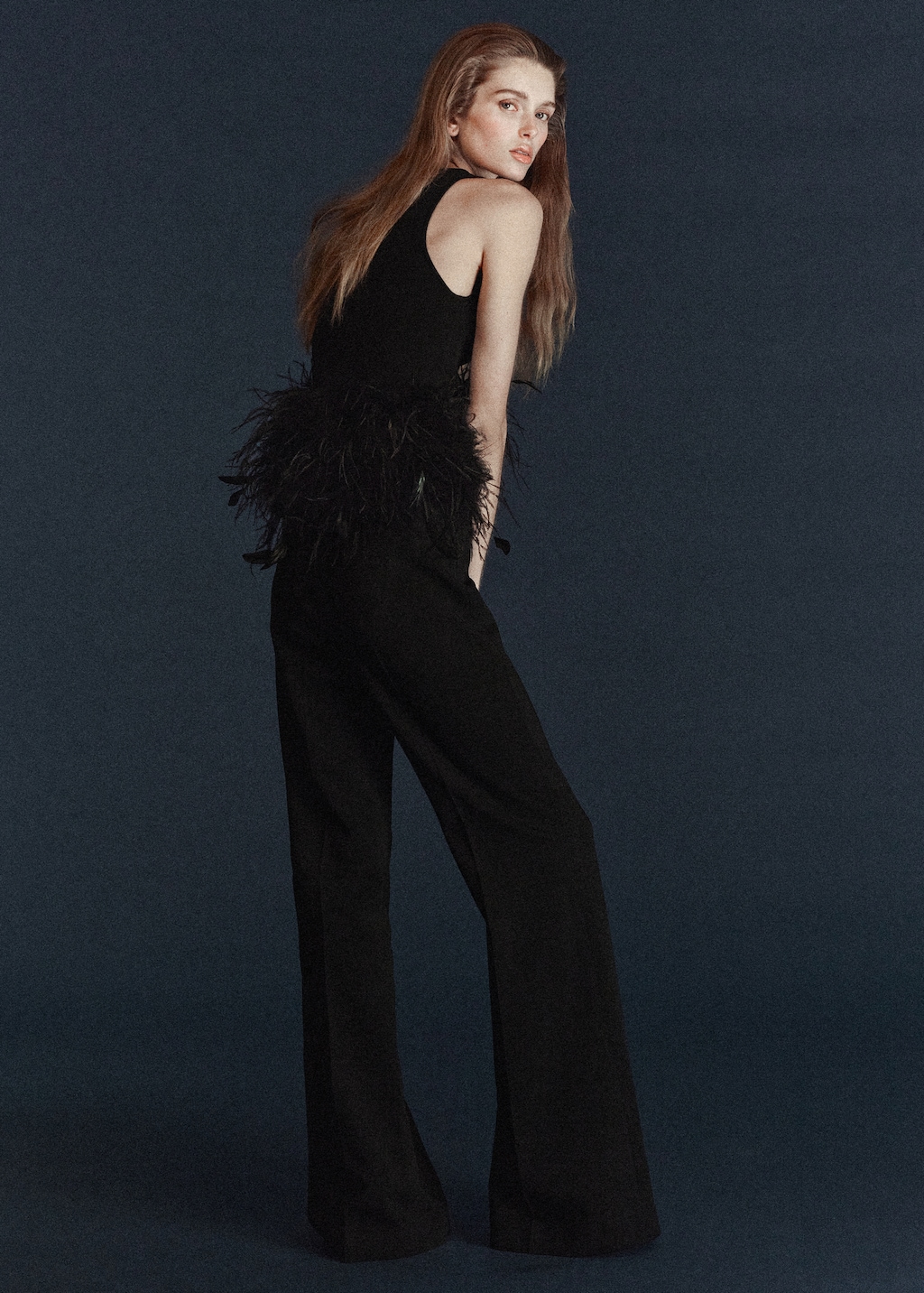 Knitted top with feather