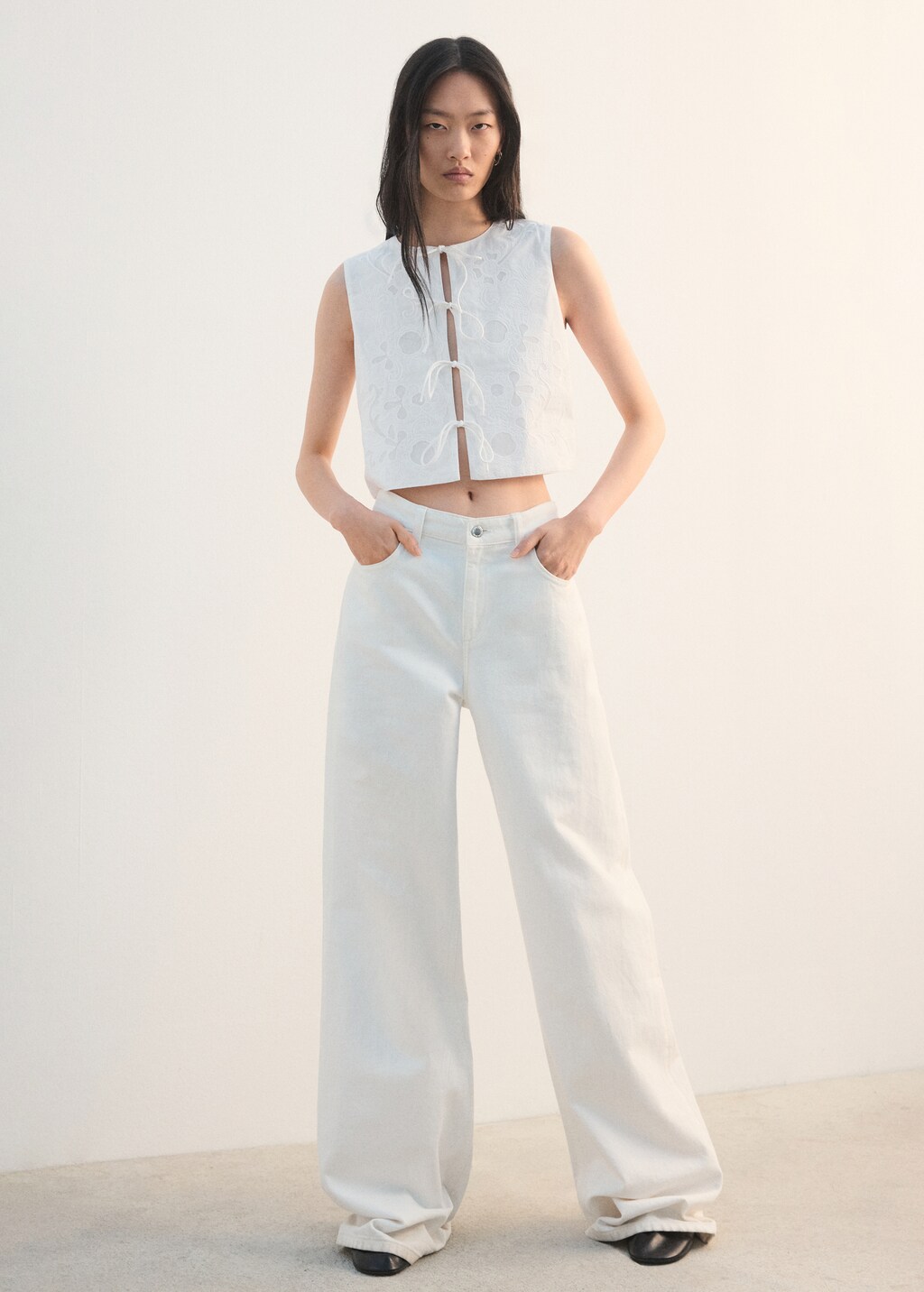 Embroidered vest with bows