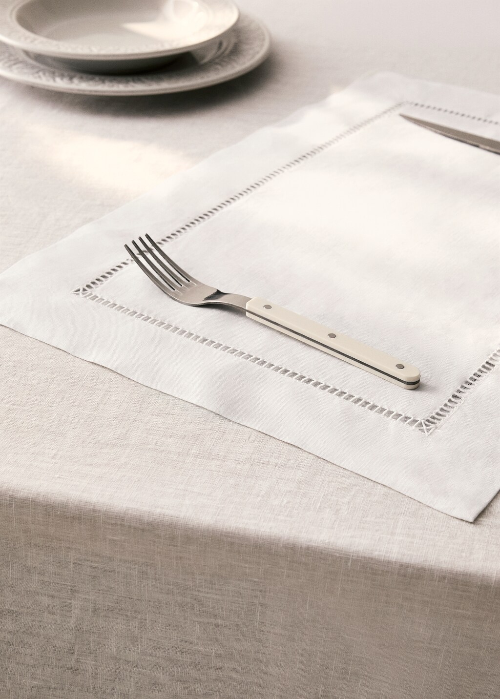 Embroidered hemstitched linen placemat