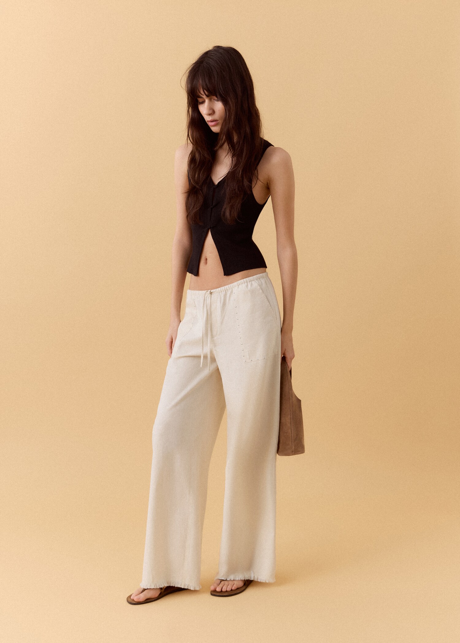 Fluid trousers with studs - General plane