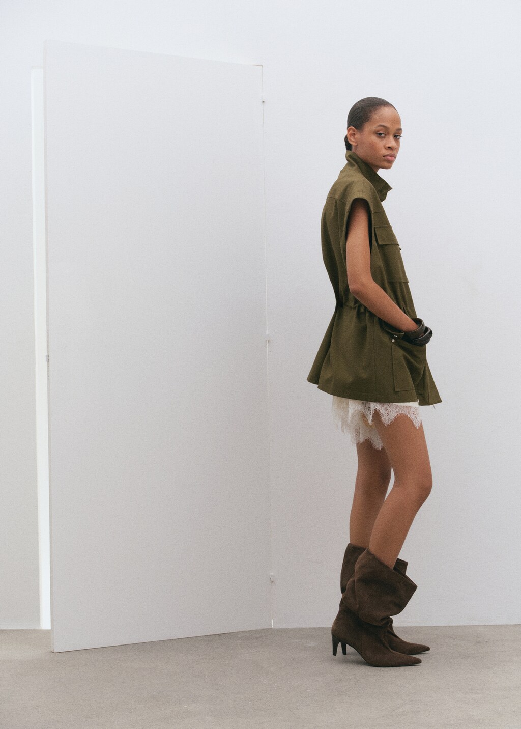 High-neck vest with pockets