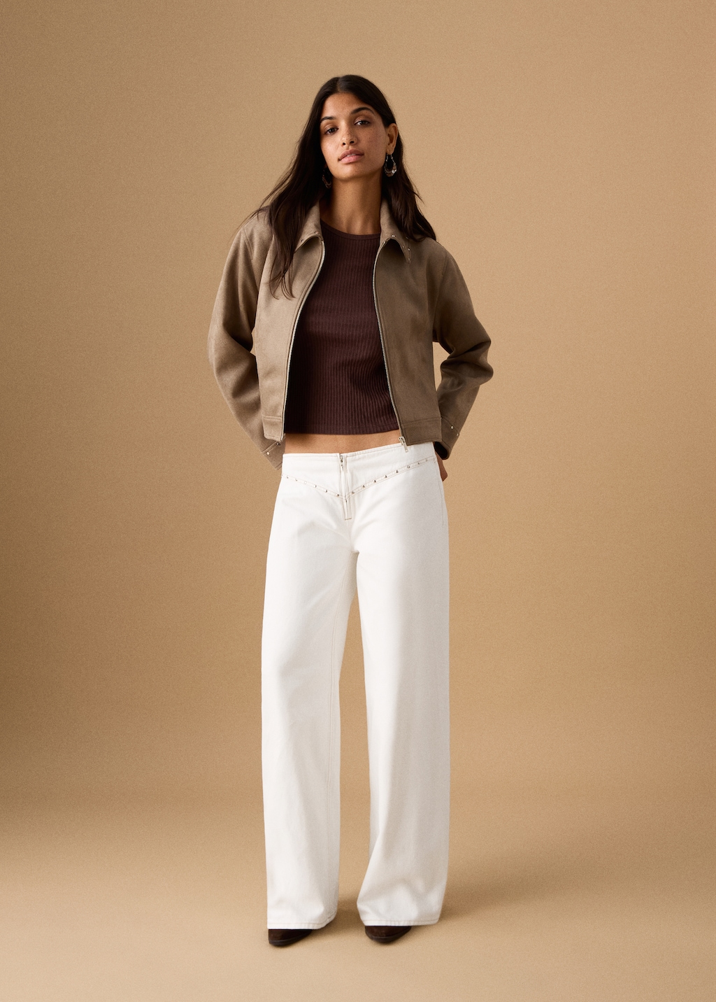 Low-waist studded jeans