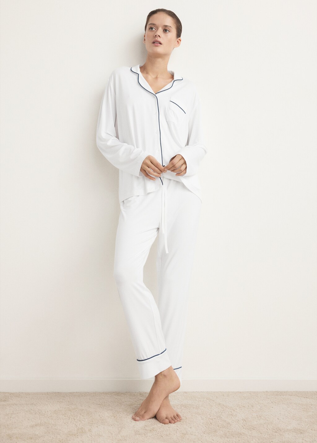 Two-piece pyjamas with piping