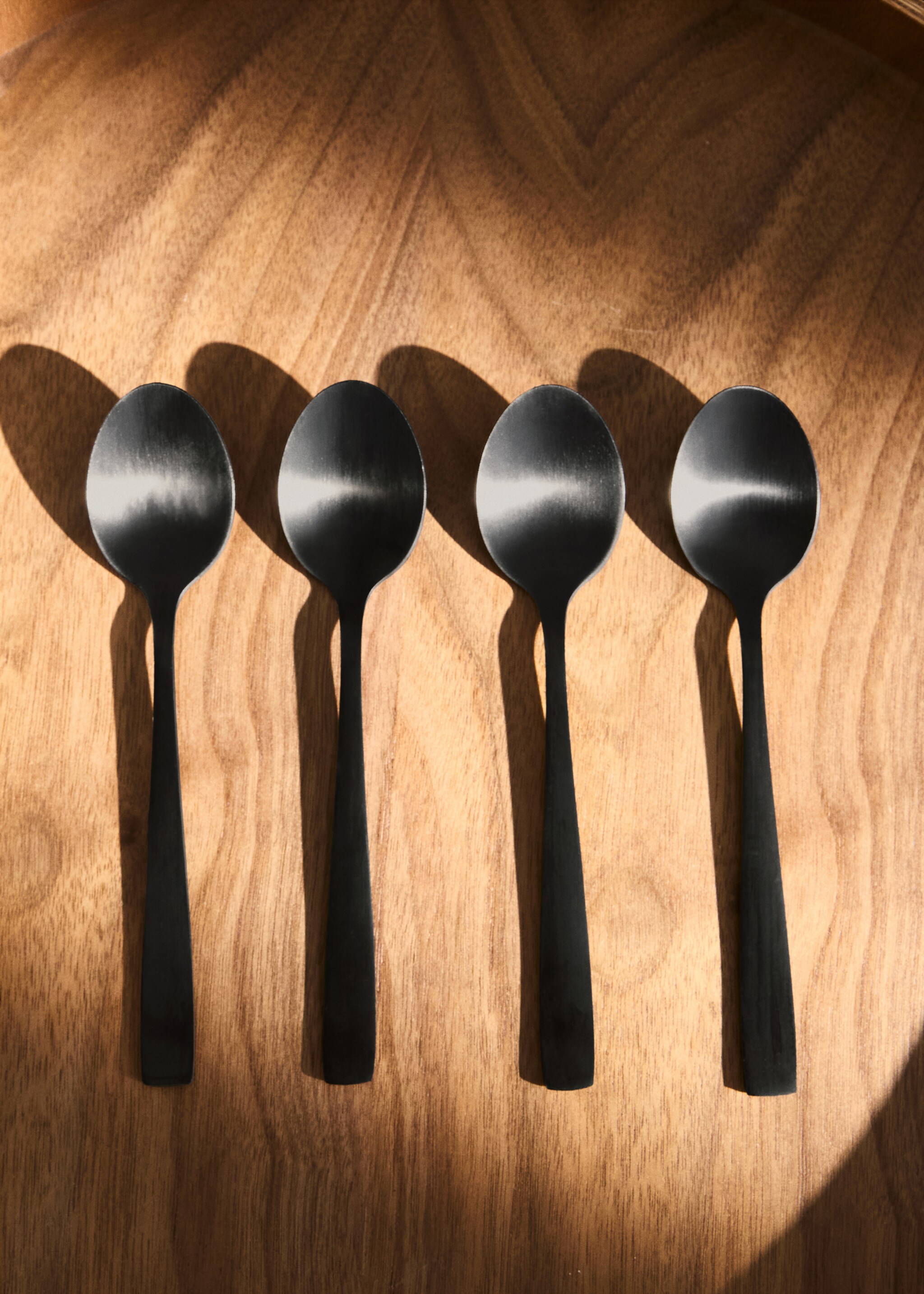 Set of 4 stainless steel dessert spoons with a matte finish - General plane, Black. Ref: 27133348-00.