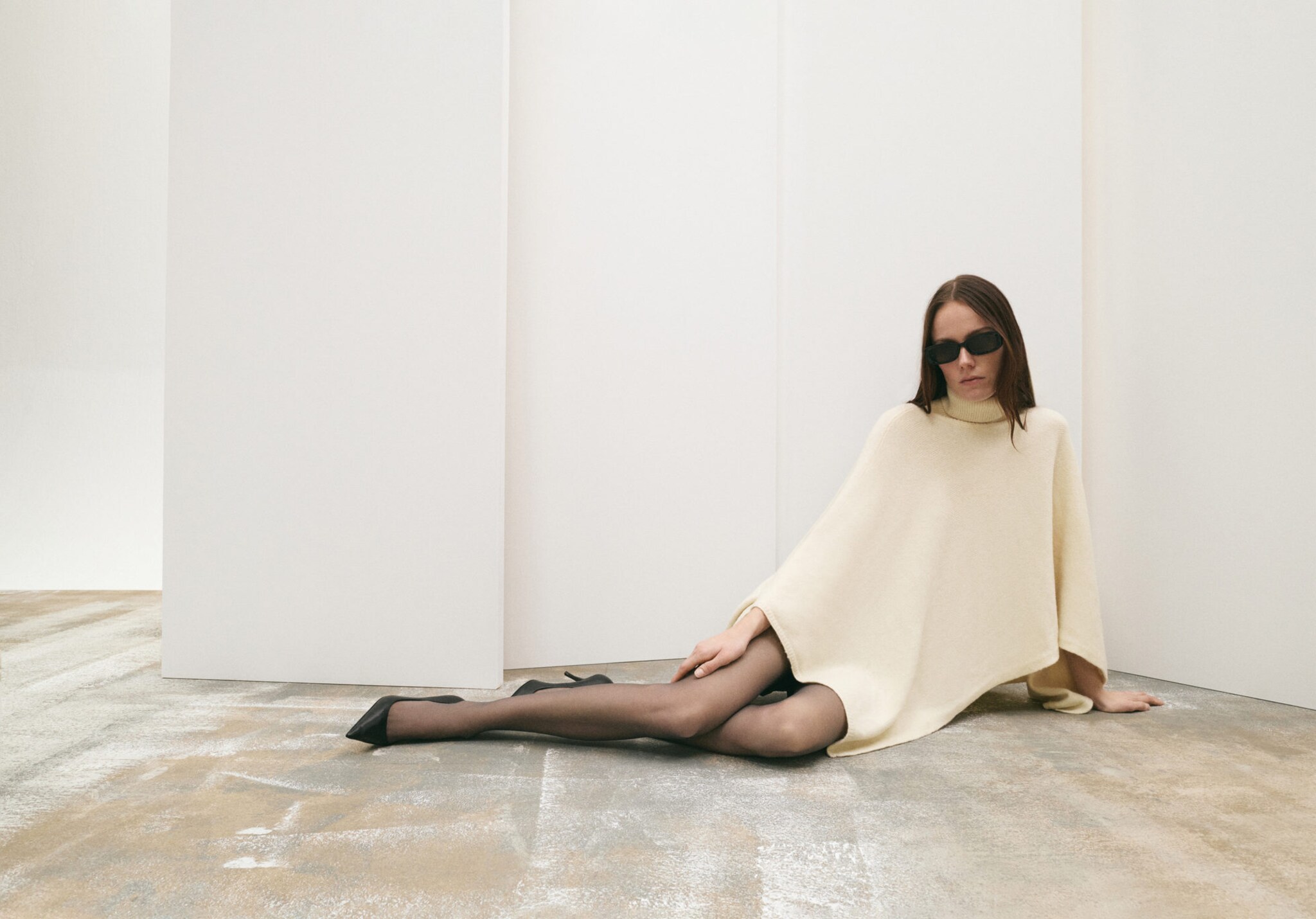 Knitted turtleneck cape - Panoramic plane