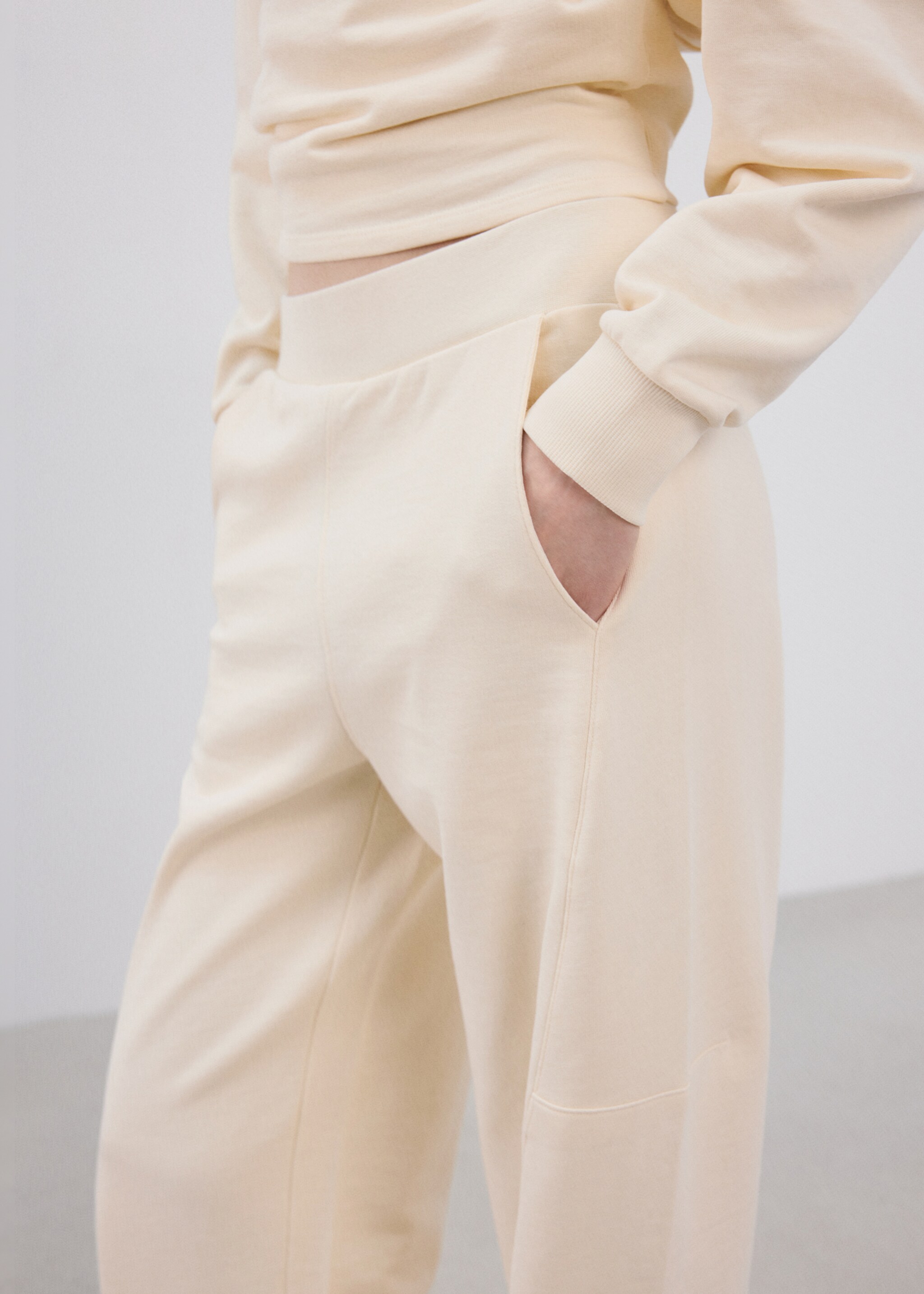 Elastic waist cotton trousers - Details of the article 1, Pastel Yellow. Ref: 27033336-01.
