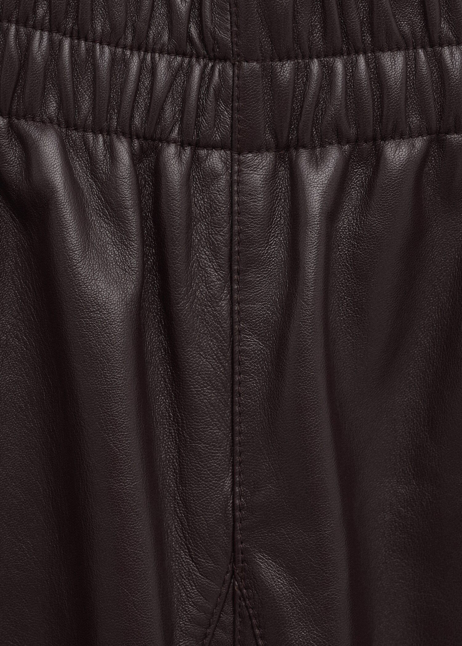 Buttoned hem leather trousers - Details of the article 8
