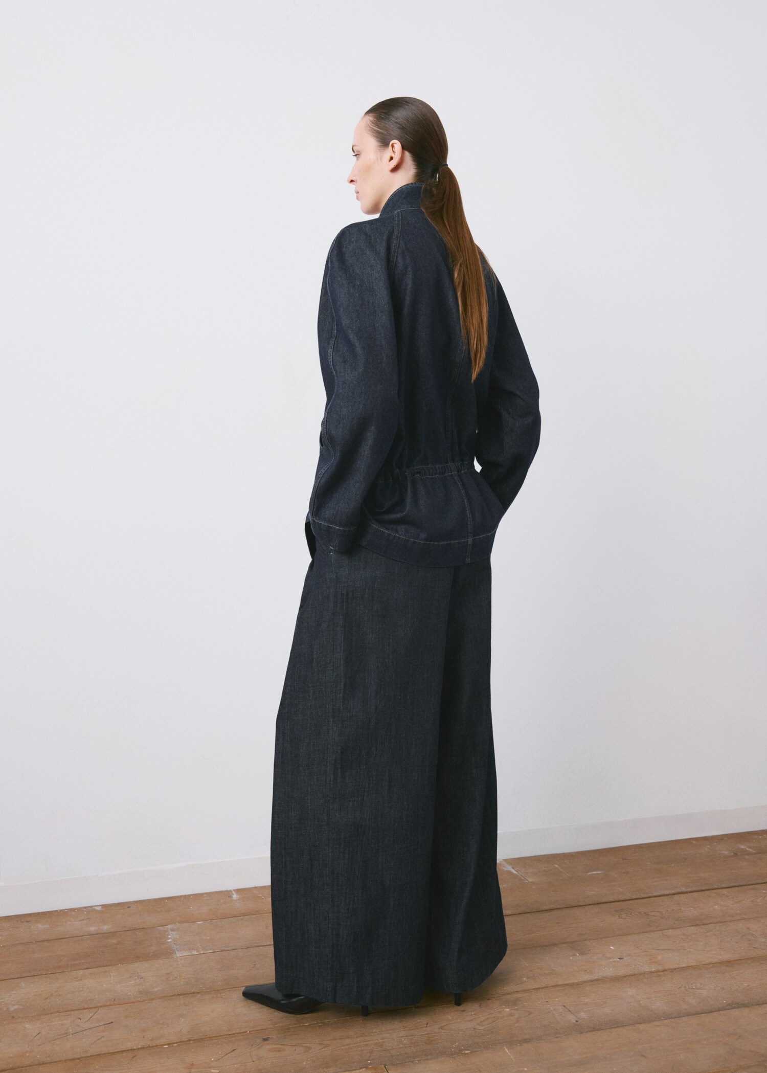 Wide leg denim trousers with belt loops - Reverse of the article