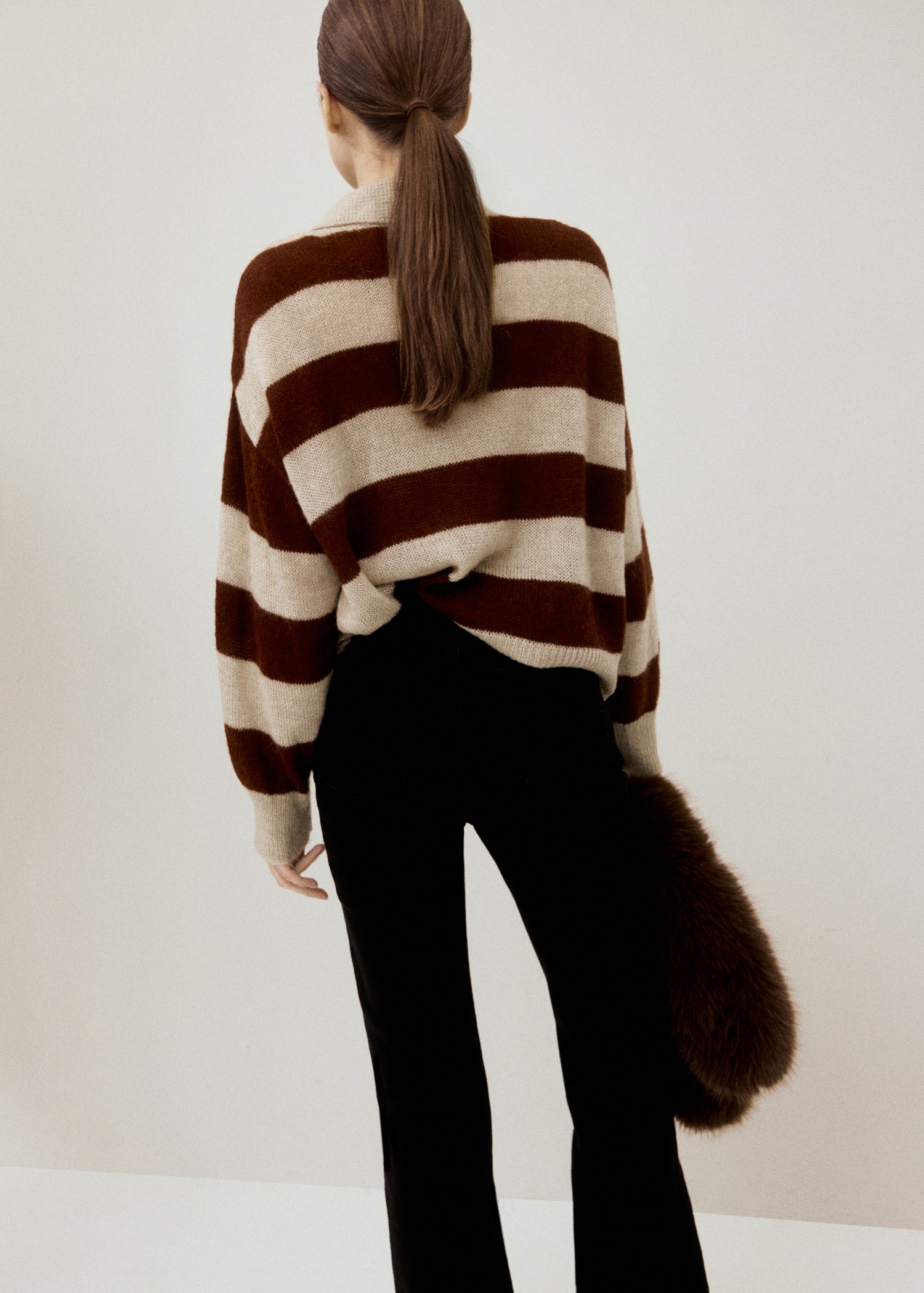 Striped polo-neck sweater - Reverse of the article
