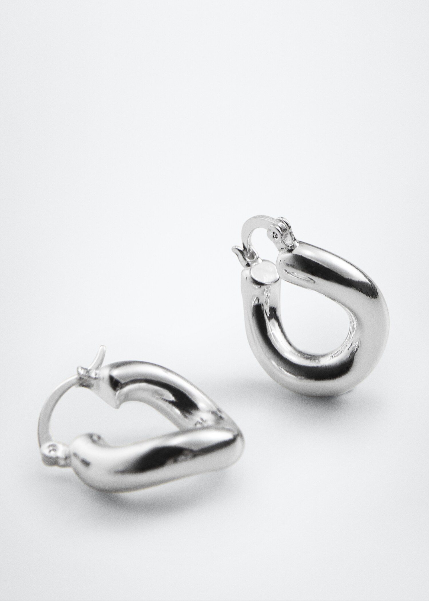 Twisted hoop earrings - Medium plane